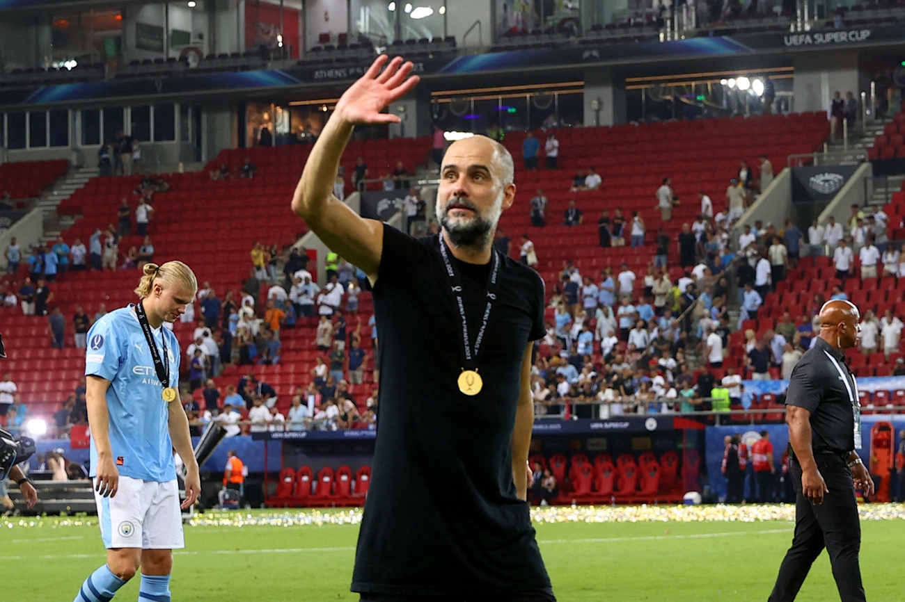 Soccer Football - UEFA Super Cup - Manchester City v Sevilla - Georgios Karaiskakis Stadium, Athens, Greece - August 16, 2023 Manchester City manager Pep Guardiola celebrates after winning the UEFA Super Cup REUTERS