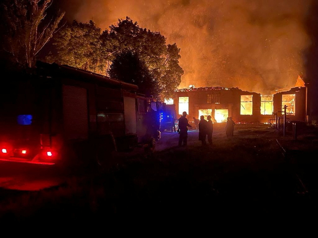 Smoke and flames rise after Ukrainian President Volodymyr Zelenskiy said a Russian-guided aerial bomb hit a blood transfusion center, in the town of Kupiansk in eastern Kharkiv, Ukraine, in this image released on August 5, 2023, and obtained from the Ukrainian President's Telegram account. Telegram
