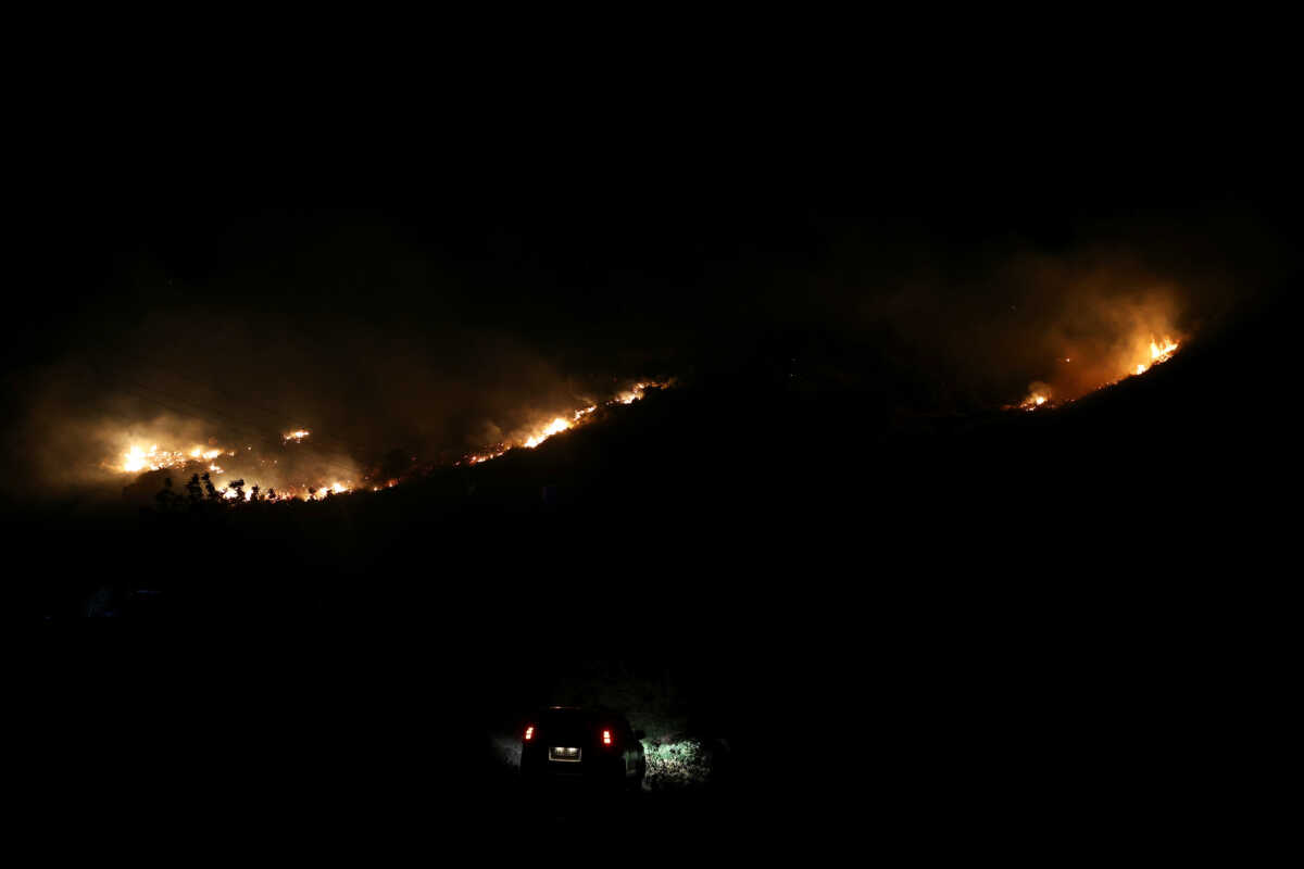 A view of a wildfire near Qeparo, Albania, August 19, 2023. REUTERS