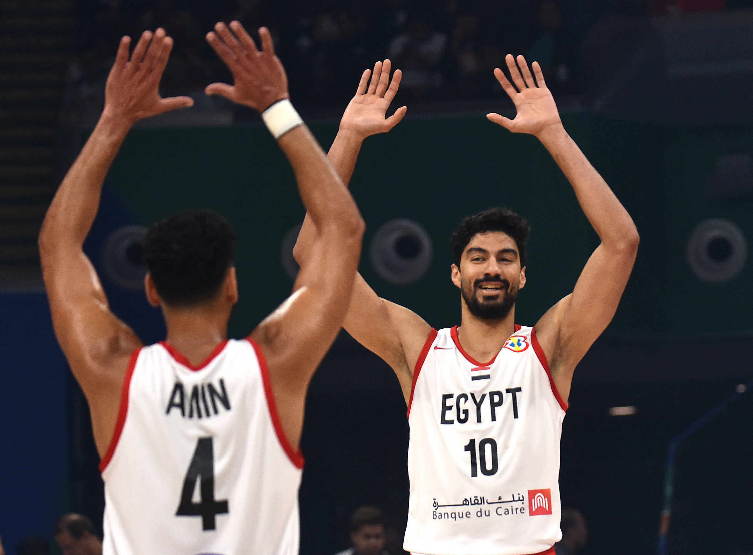 Basketball - FIBA World Cup 2023 - Classification Round 17-32 - Group N - Egypt v Jordan - Mall of Asia Arena, Manila, Philippines - August 31, 2023 Egypt's Anas Mahmoud and Egypt's Ehab Amin react REUTERS