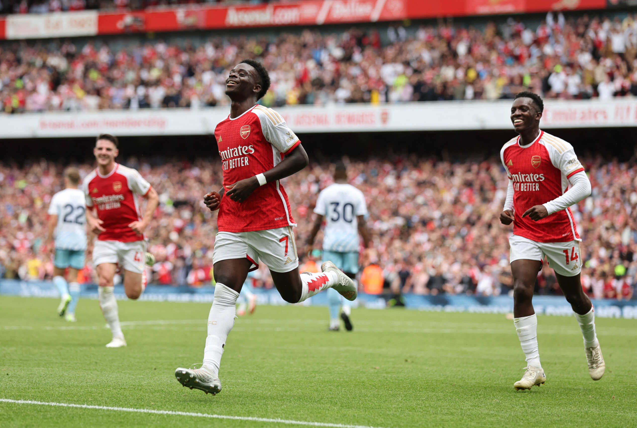 Soccer Football - Premier League - Arsenal v Nottingham Forest - Emirates Stadium, London, Britain - August 12, 2023 Arsenal's Bukayo Saka celebrates scoring their second goal with Eddie Nketiah REUTERS