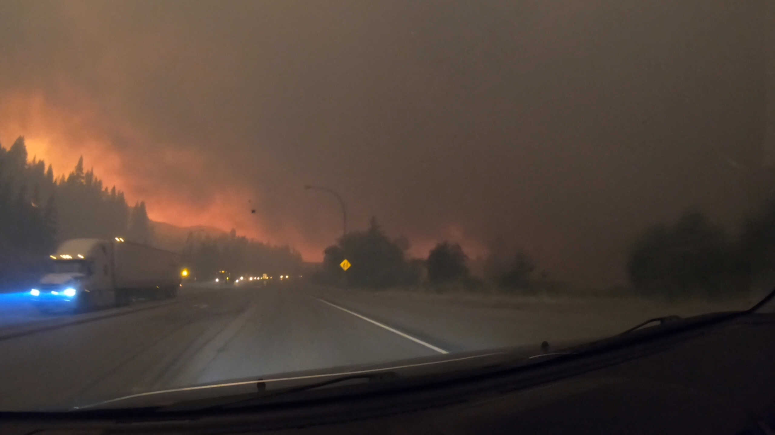 A view shows wildfires in Squilax, British Columbia, Canada August 18, 2023, in this screen grab obtained from a social media video X@AlpineLifer