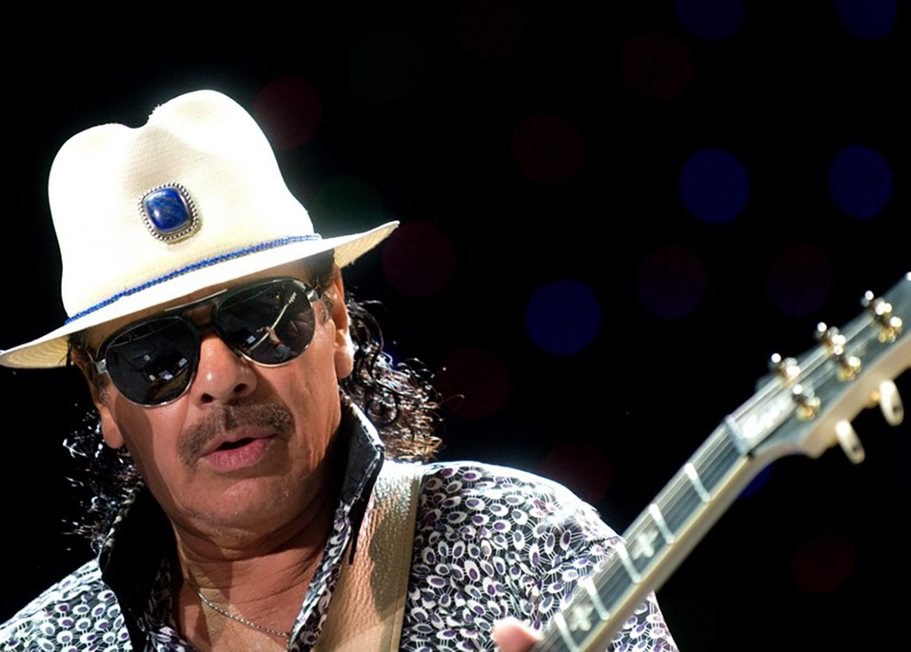 epa06084514 (FILE) Mexican musician Carlos Santana performs at the Papp Laszlo Budapest Sports Arena in Budapest, Hungary, 05 July 2011 (reissued 13 July 2017). Carlos Santana will celebrate his 70th birthday on 20 July 2017.  EPA