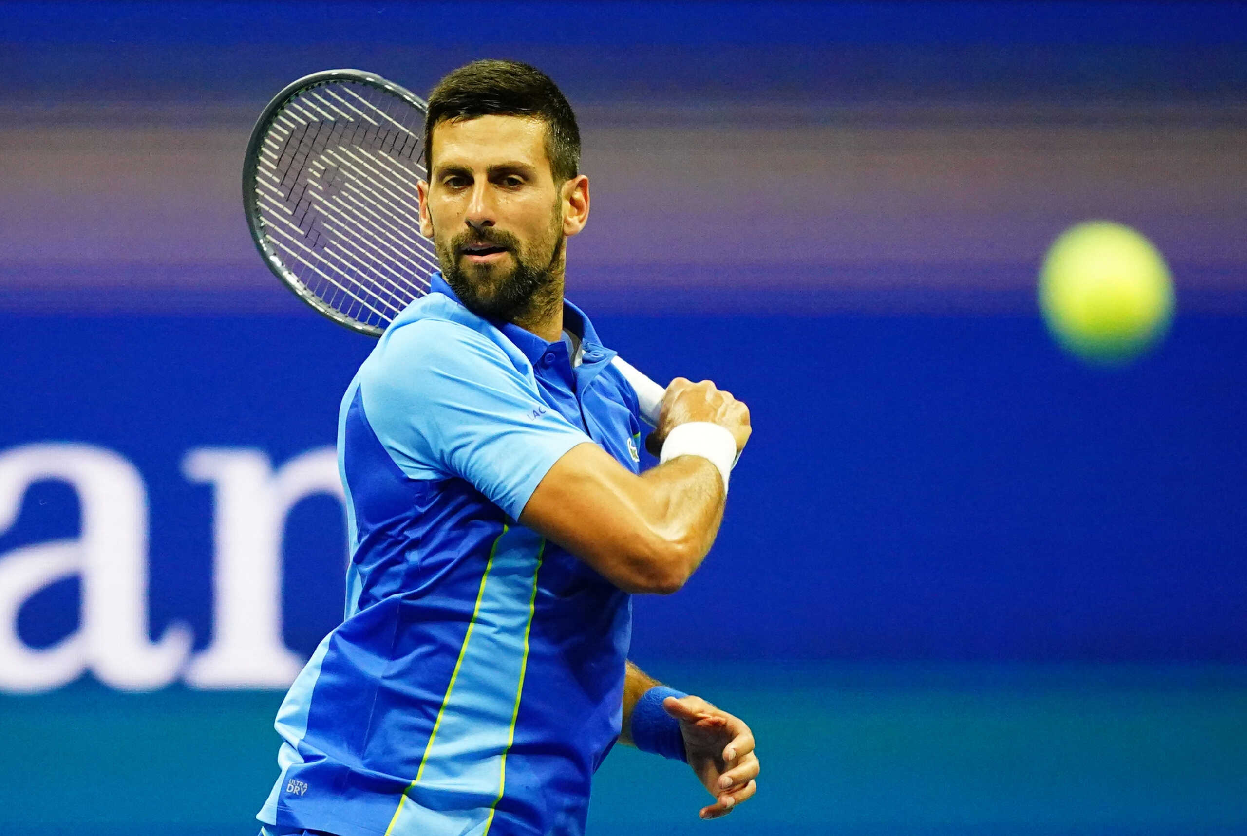 Aug 28, 2023; Flushing, NY, USA;  Novak Djokovic of Serbia hits a shot against Alexandre Muller of France on day one of the 2023 U.S. Open tennis tournament at the USTA Billie Jean King National Tennis Center. Mandatory Credit: Jerry Lai-USA TODAY Sports
