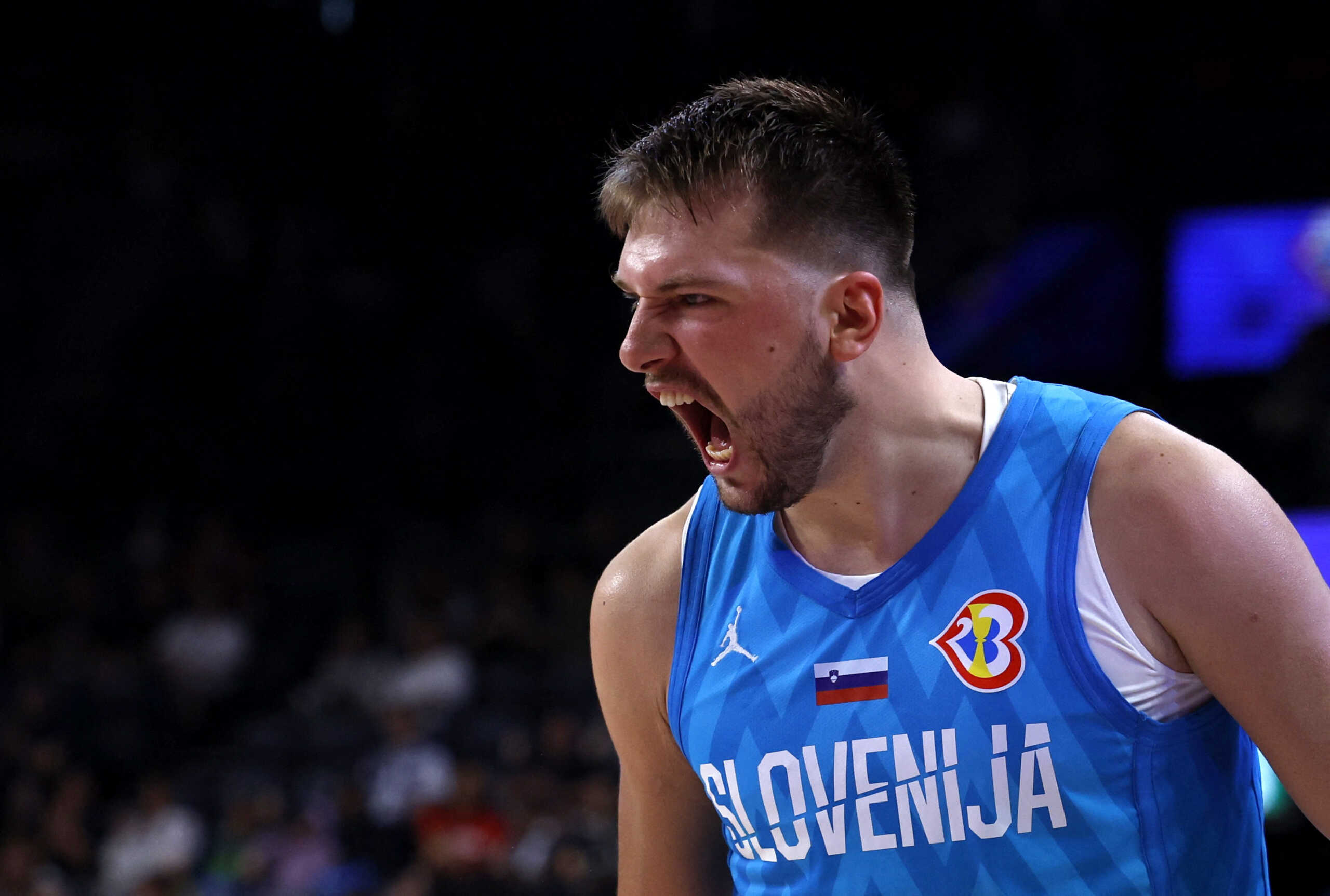 Basketball - FIBA World Cup 2023 - First Round - Group F - Georgia v Slovenia - Okinawa Arena, Okinawa, Japan - August 28, 2023 Slovenia's Luka Doncic reacts REUTERS