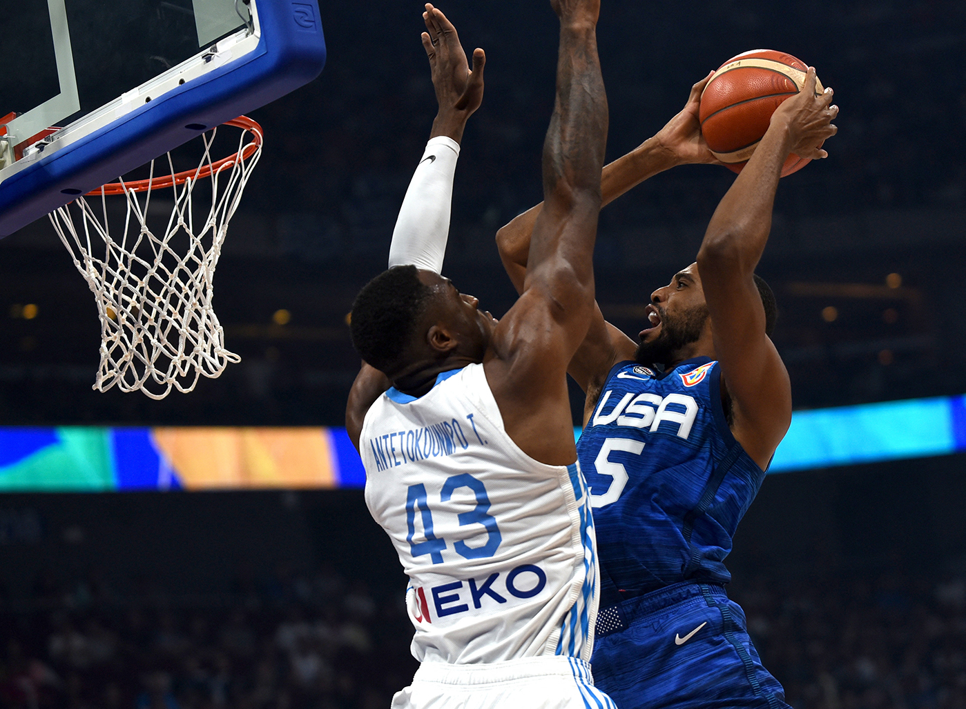 Basketball - FIBA World Cup 2023 - First Round - Group C - Greece v United States of America - Mall of Asia Arena, Manila, Philippines - August 28, 2023
Mikal Bridges of the U.S. in action with Greece's Thanasis Antetokounmpo REUTERS