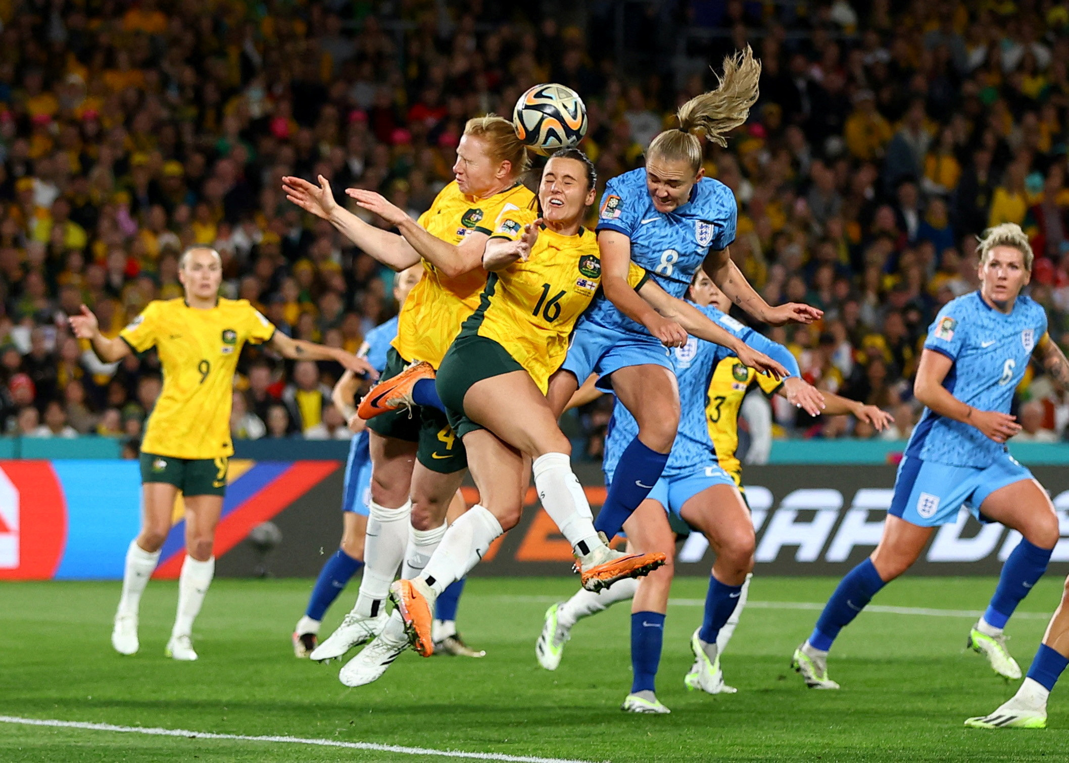 Soccer Football - FIFA Women’s World Cup Australia and New Zealand 2023 - Semi Final - Australia v England - Stadium Australia, Sydney, Australia - August 16, 2023 England's Georgia Stanway in action with Australia's Hayley Raso and Clare Polkinghorne REUTERS