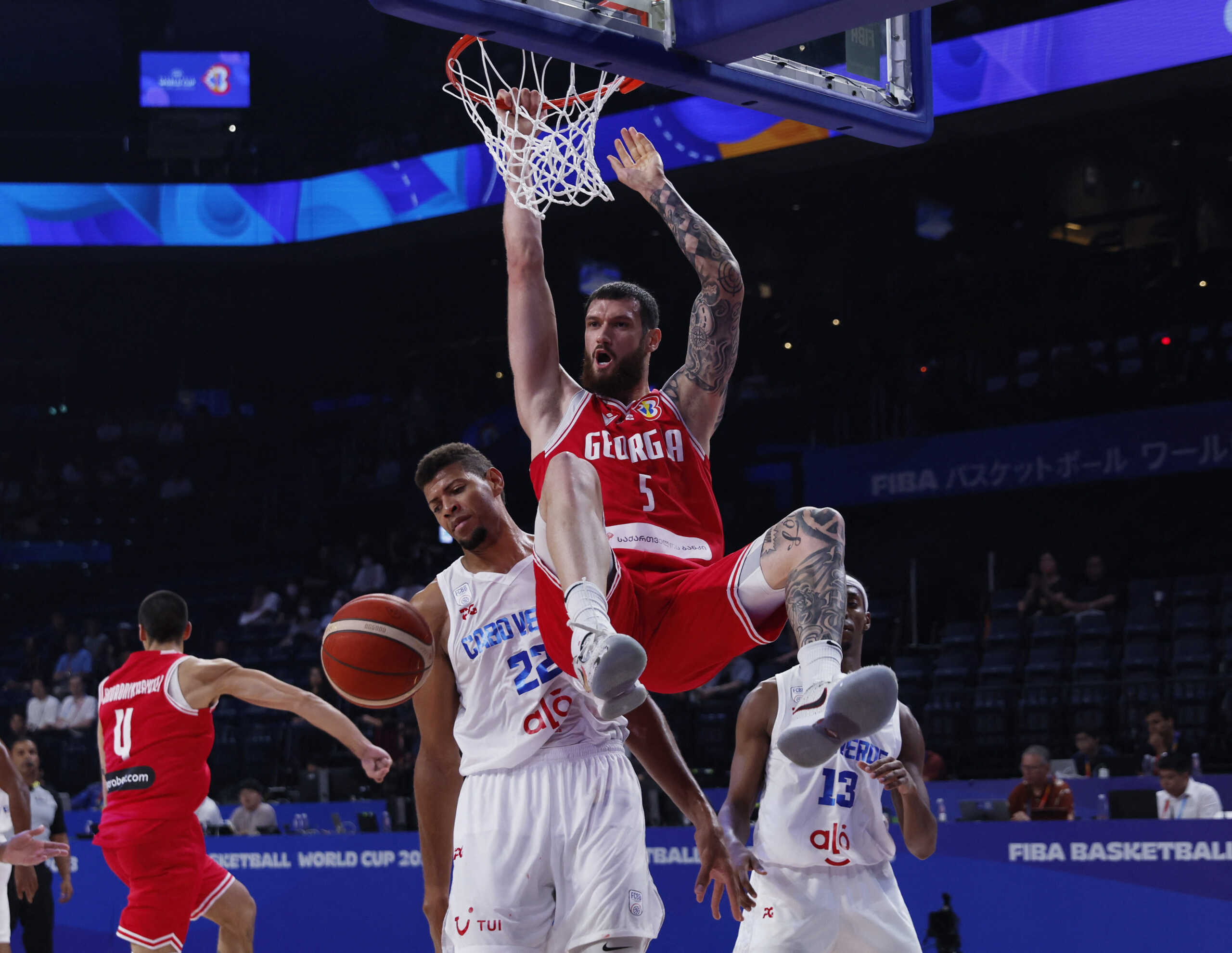 Basketball - FIBA World Cup 2023 - First Round - Group F - Cape Verde v Georgia - Okinawa Arena, Okinawa, Japan - August 26, 2023 Georgia's Alexander Mamukelashvili scores a basket REUTERS