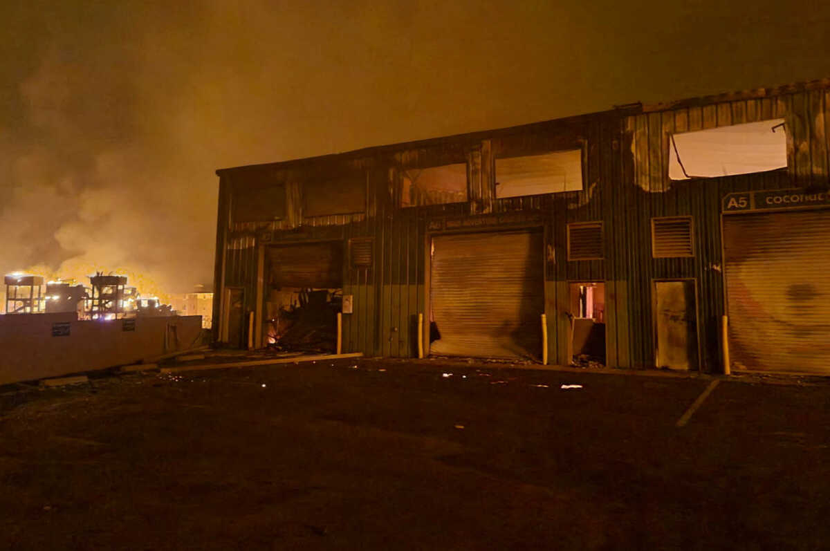 Smoke billows from flames near Lahaina as wildfires driven by high winds destroy a large part of the historic town of Lahaina, Hawaii, U.S. August 9, 2023. Dustin Johnson