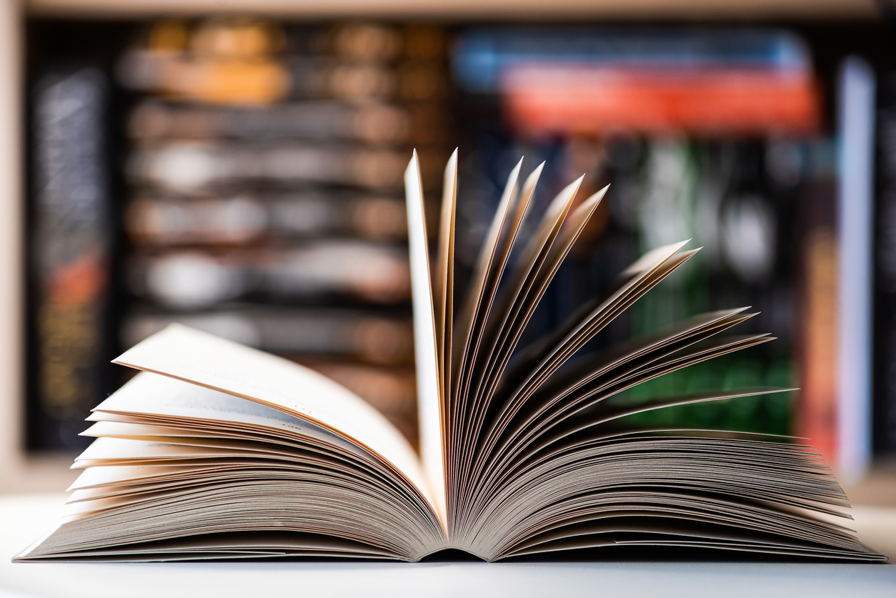 open book close up photo, blurred background