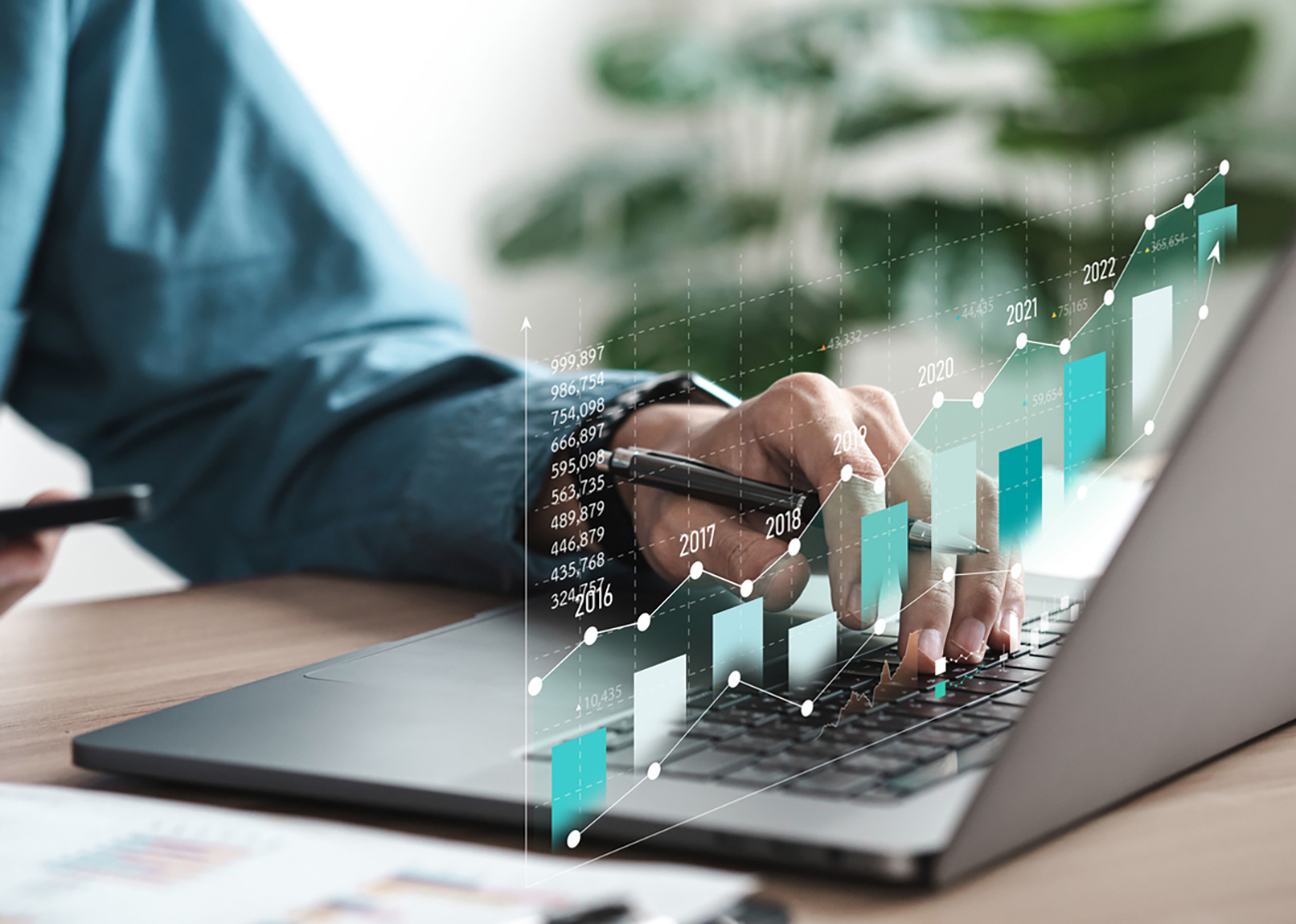 Businessman analyzing digital financial balance sheet of company working with digital virtual graphic design. Calculating long-term investment financial data icon on touch screen