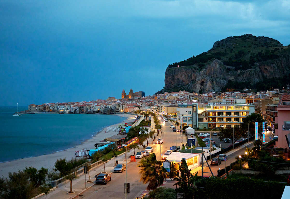 Aerial view of Cefalu, Sicily, Italy on the Tyrrhenian Sea at dusk.