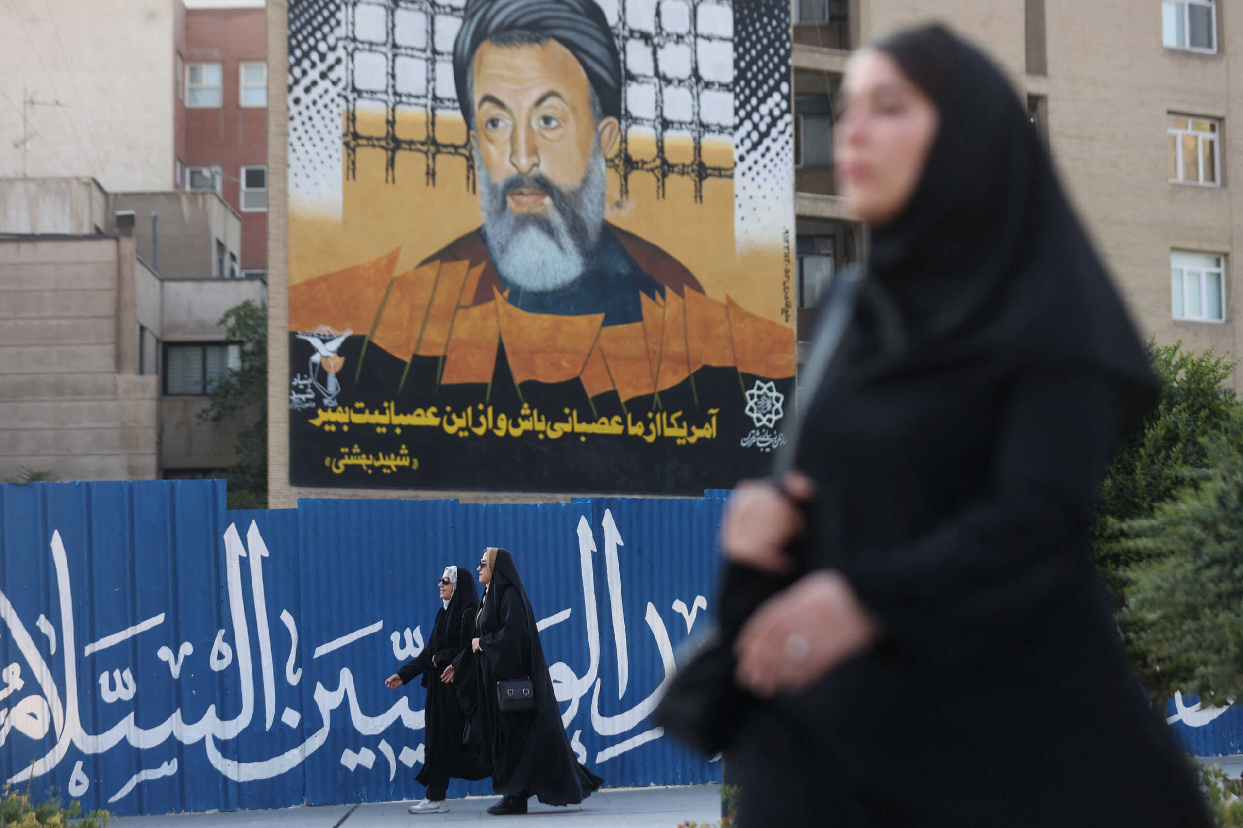 Iranian women walk on a street in Tehran, Iran August 13, 2023. Majid Asgaripour