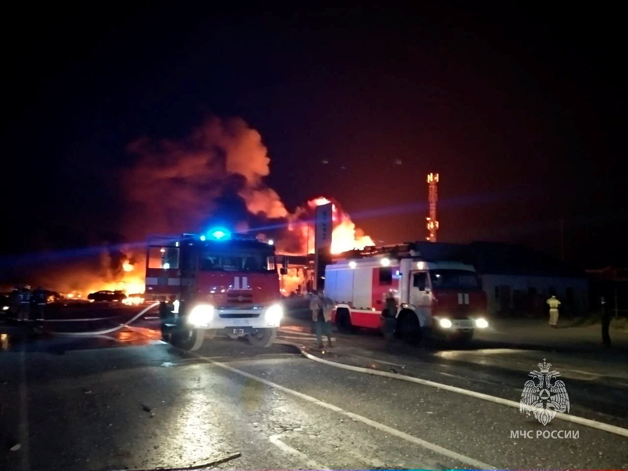 A view shows firefighting vehicles at the accident scene following an explosion at a gas station in the city of Makhachkala, Russia, August 14, 2023. Russian Emergencies Ministry in the Republic of Dagestan