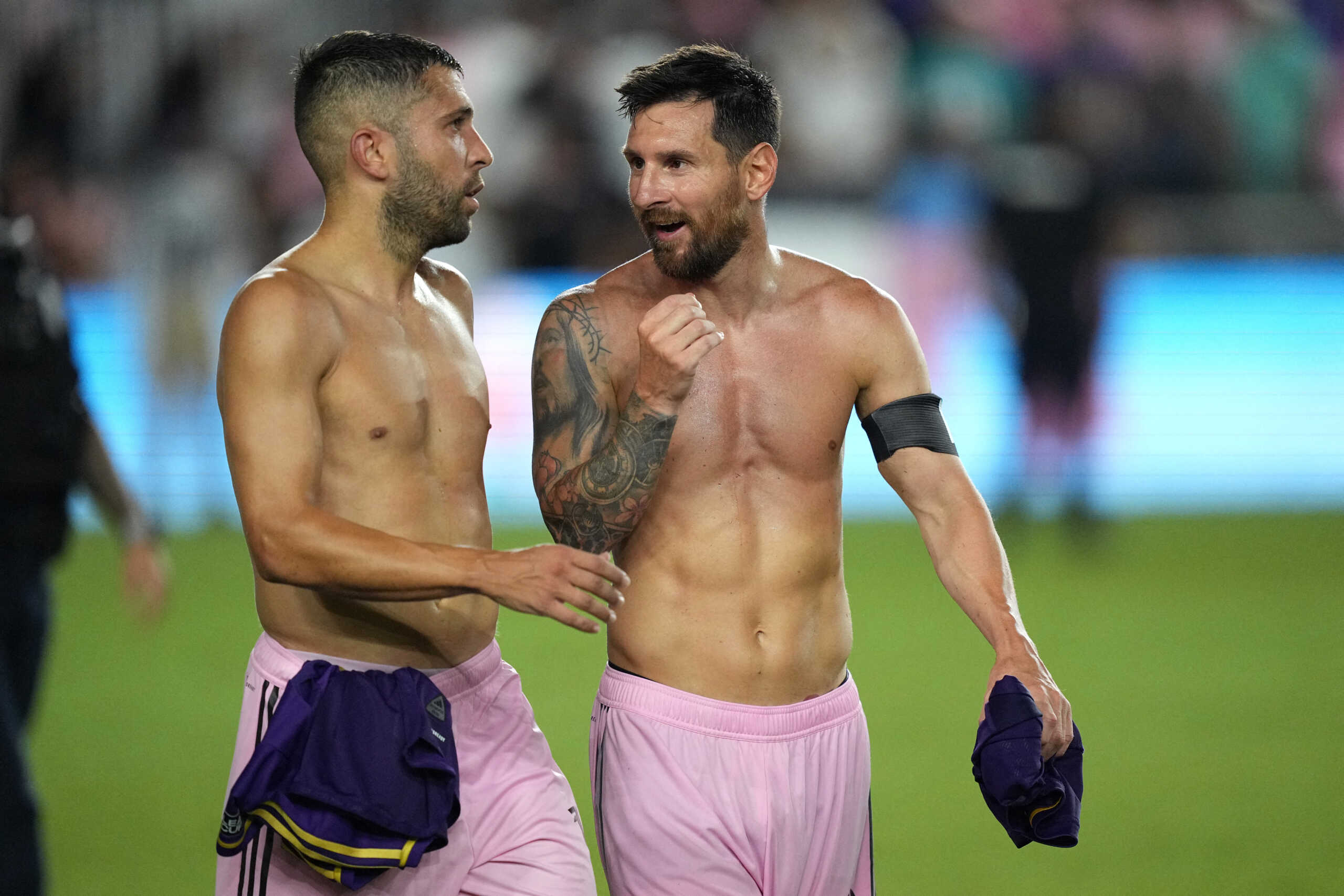 Aug 2, 2023; Fort Lauderdale, FL, USA; Inter Miami CF forward Lionel Messi (right) and defender Jordi Alba (18) look on after the match against Orlando City SC at DRV PNK Stadium. Mandatory Credit: Jim Rassol-USA TODAY Sports
