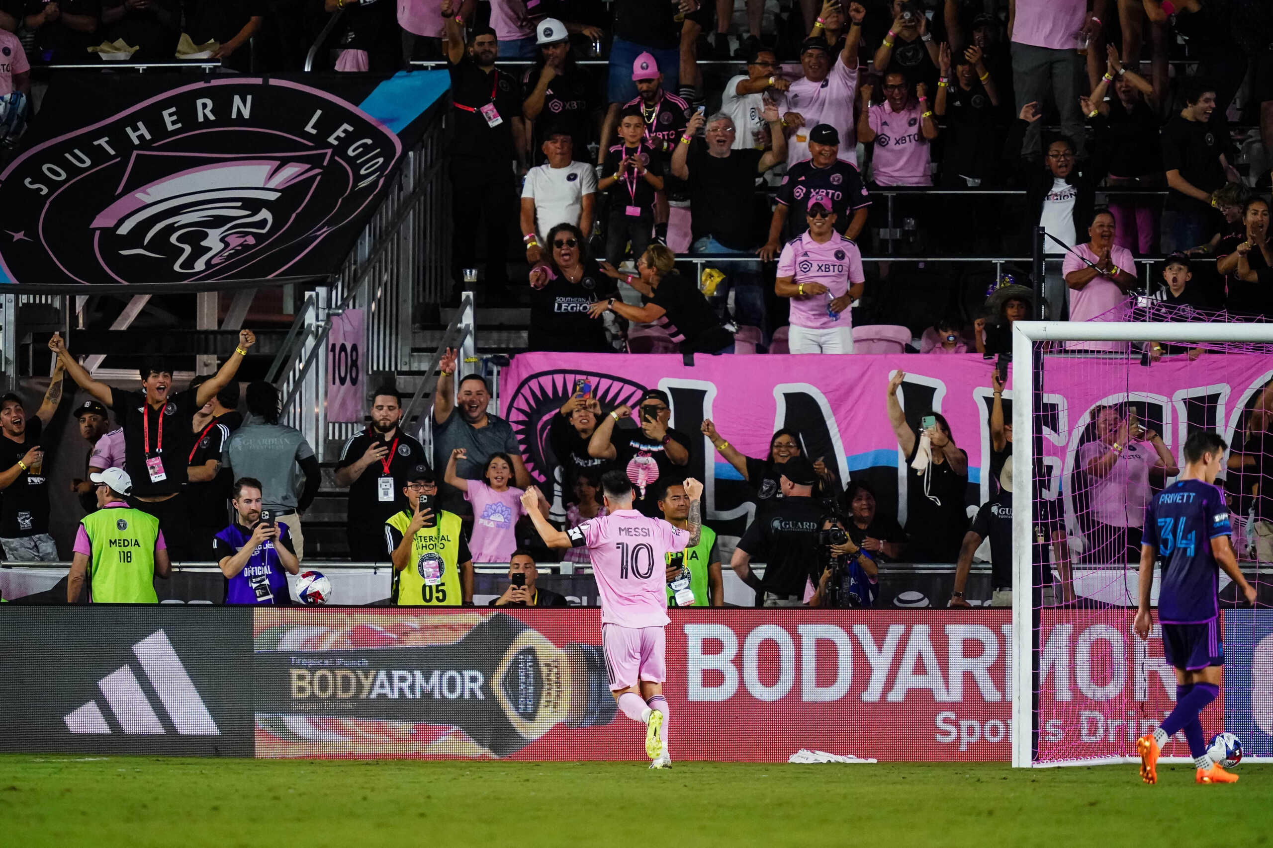 Aug 11, 2023; Fort Lauderdale, FL, USA; Inter Miami CF forward Lionel Messi (10) celebrates with fans after a Charlotte FC own goal in the second half at DRV PNK Stadium. Mandatory Credit: John David Mercer-USA TODAY Sports