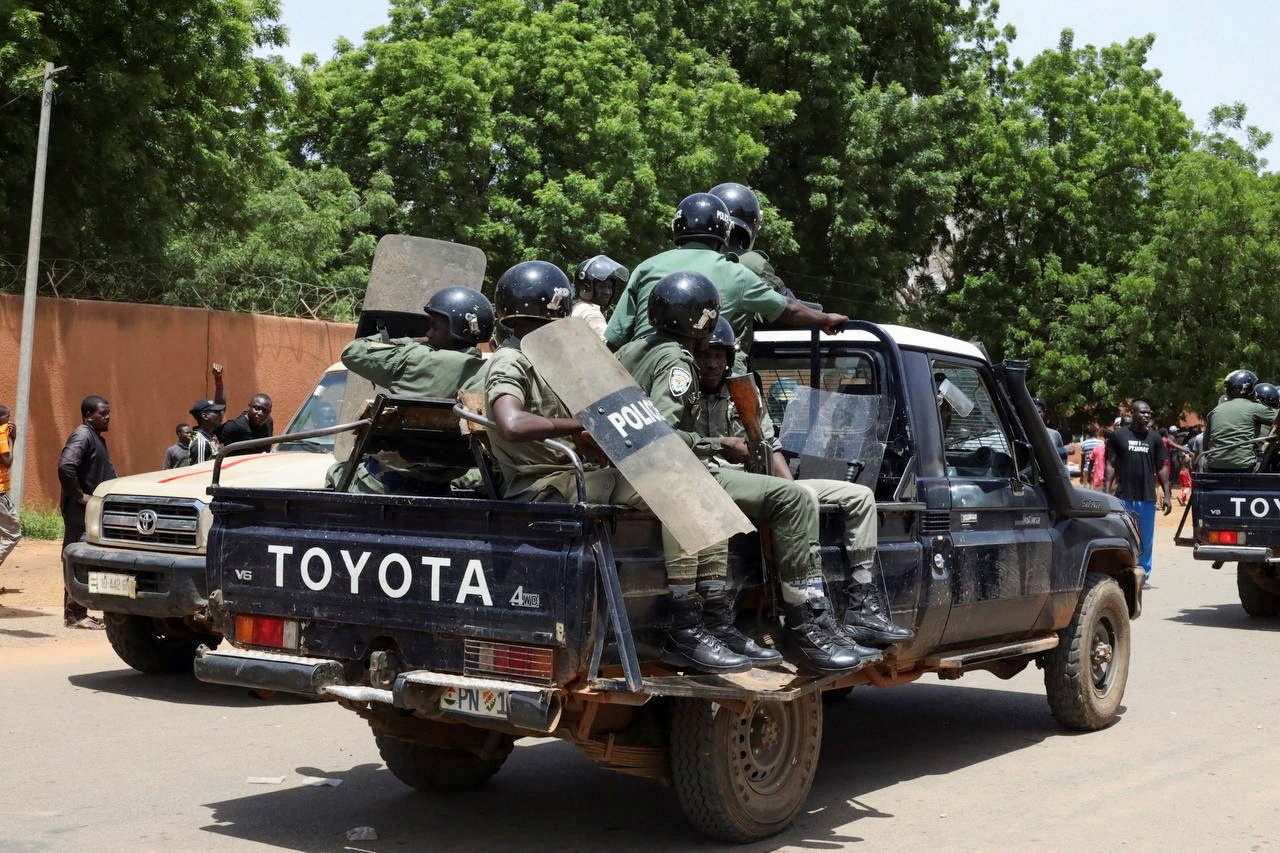 Nigerien security forces prepare to disperse pro-junta demonstrators gathered outside the French embassy, in Niamey, the capital city of Niger July 30, 2023. REUTERS