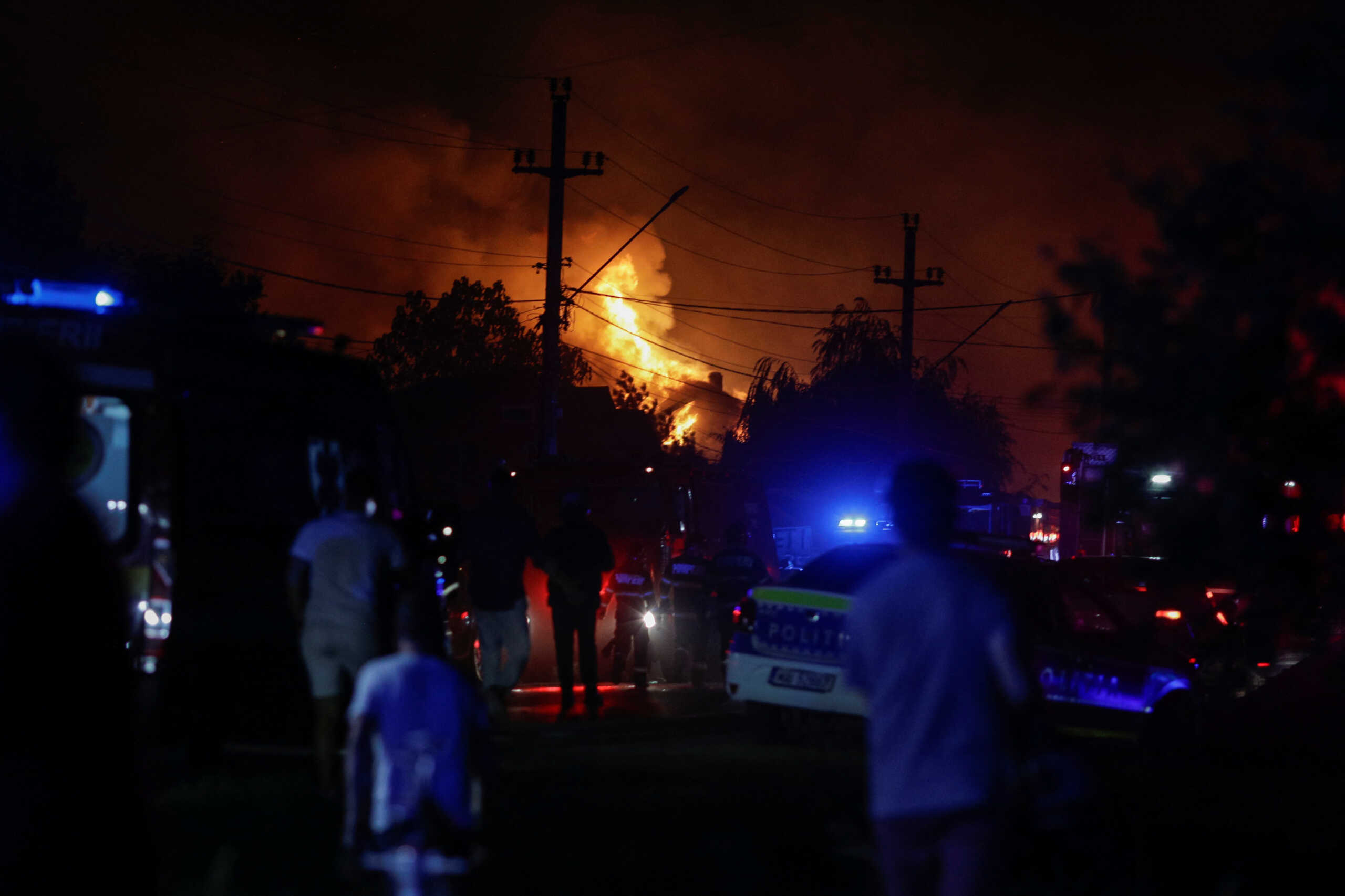 Flames rise after an explosion at a LPG station in Crevedia, near Bucharest, Romania, August 26, 2023. Inquam Photos