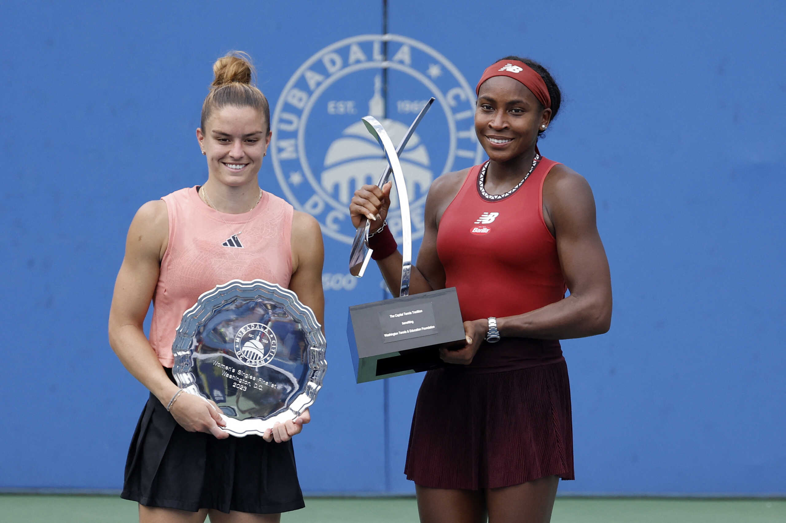 Aug 6, 2023; Washington, D.C., USA; (L-R) Maria Sakkari (GRE) and Coco Gauff (USA) hold the finalist and Donald Dell championship trophy, respectively, after their women's singles final on day nine of the Mubadala Citi DC Open at Fitzgerald Tennis Stadium. Mandatory Credit: Geoff Burke-USA TODAY Sports