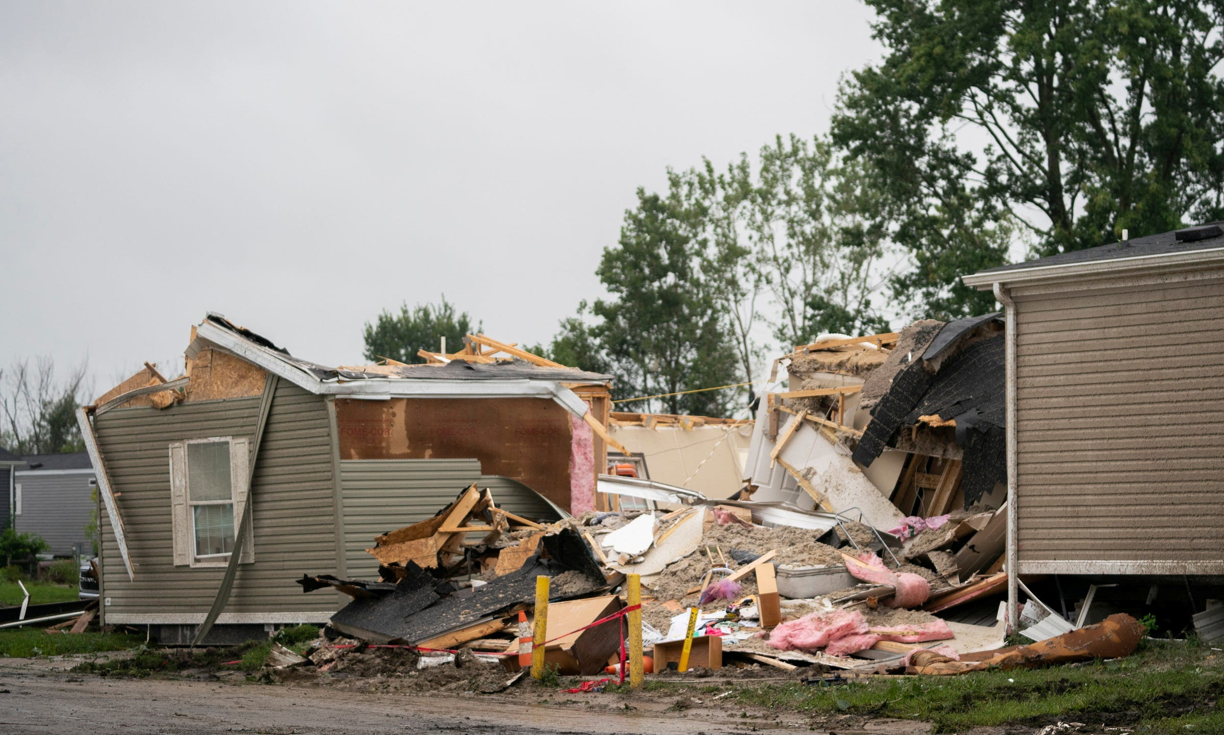 A home is damaged in Newport, Michigan, U.S., on August 25, 2023 after a heavy band of storms hit the region the night before. Mandi Wright