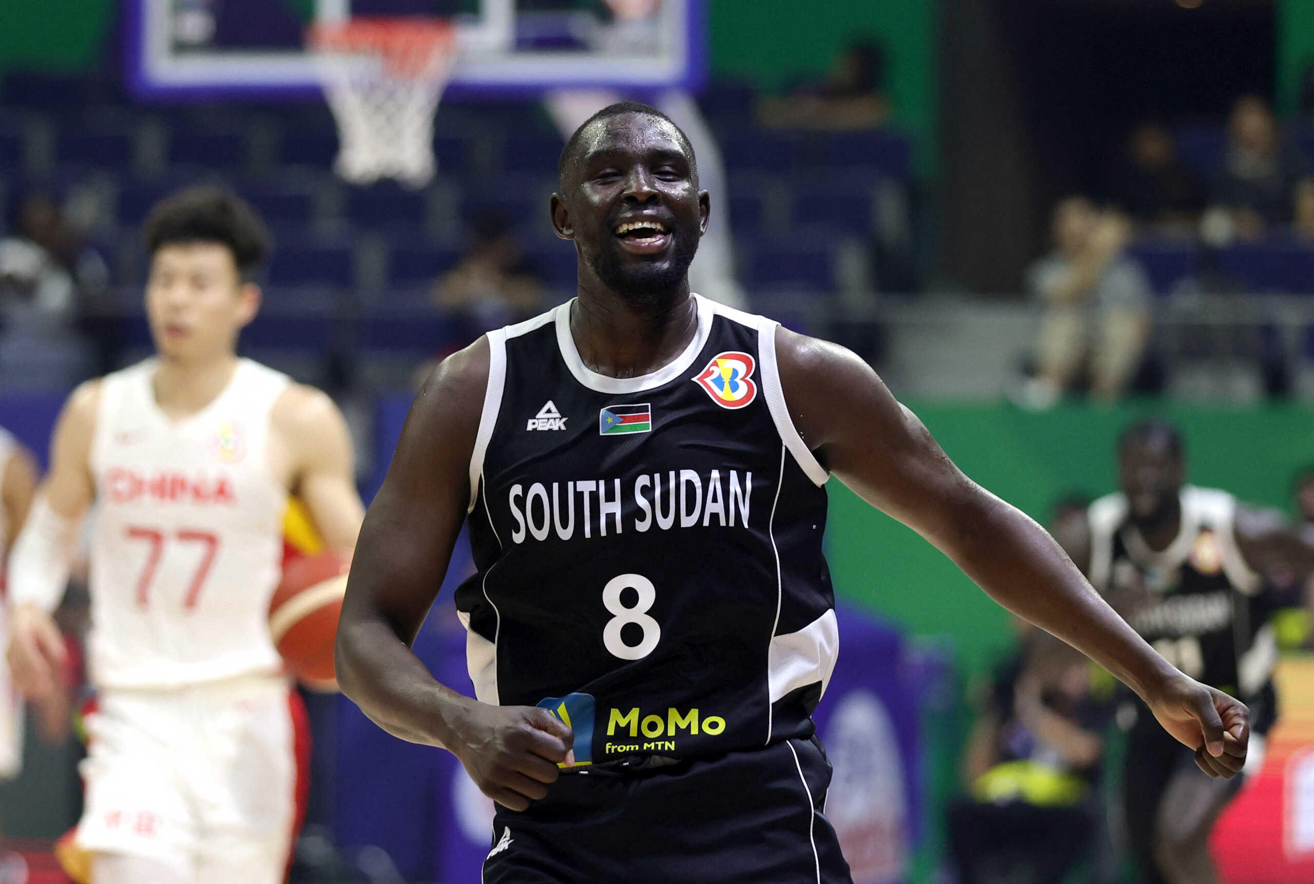 Basketball - FIBA World Cup 2023 - First Round - Group B - China v South Sudan - Araneta Coliseum, Quezon, Philippines - August 28, 2023 South Sudan's Kuany Ngor Kuany reacts REUTERS