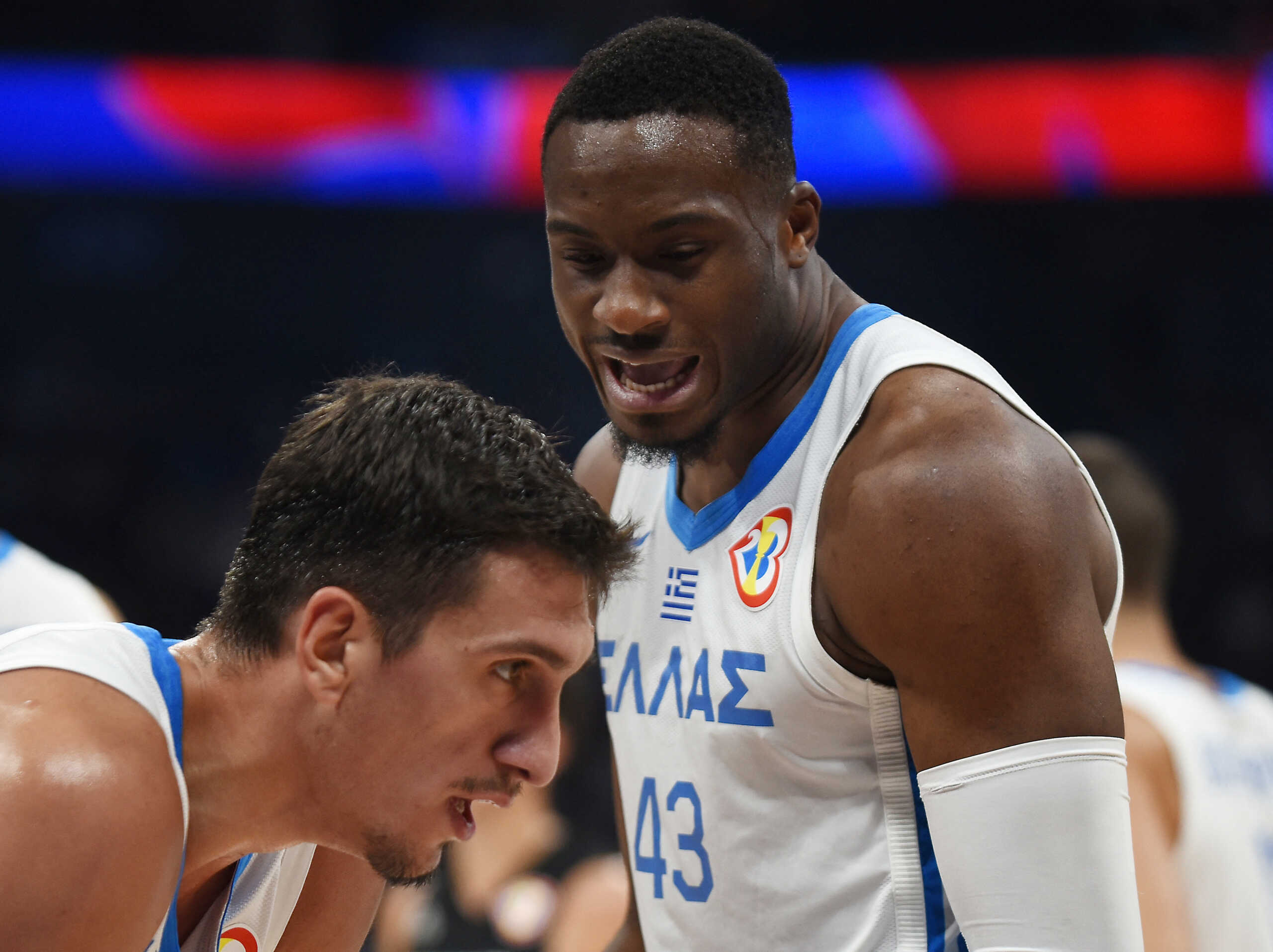 Basketball - FIBA World Cup 2023 - First Round - Group C - Greece v New Zealand - Mall of Asia Arena, Manila, Philippines - August 30, 2023 Greece's Giannoulis Larentzakis and Greece's Thanasis Antetokounmpo react REUTERS