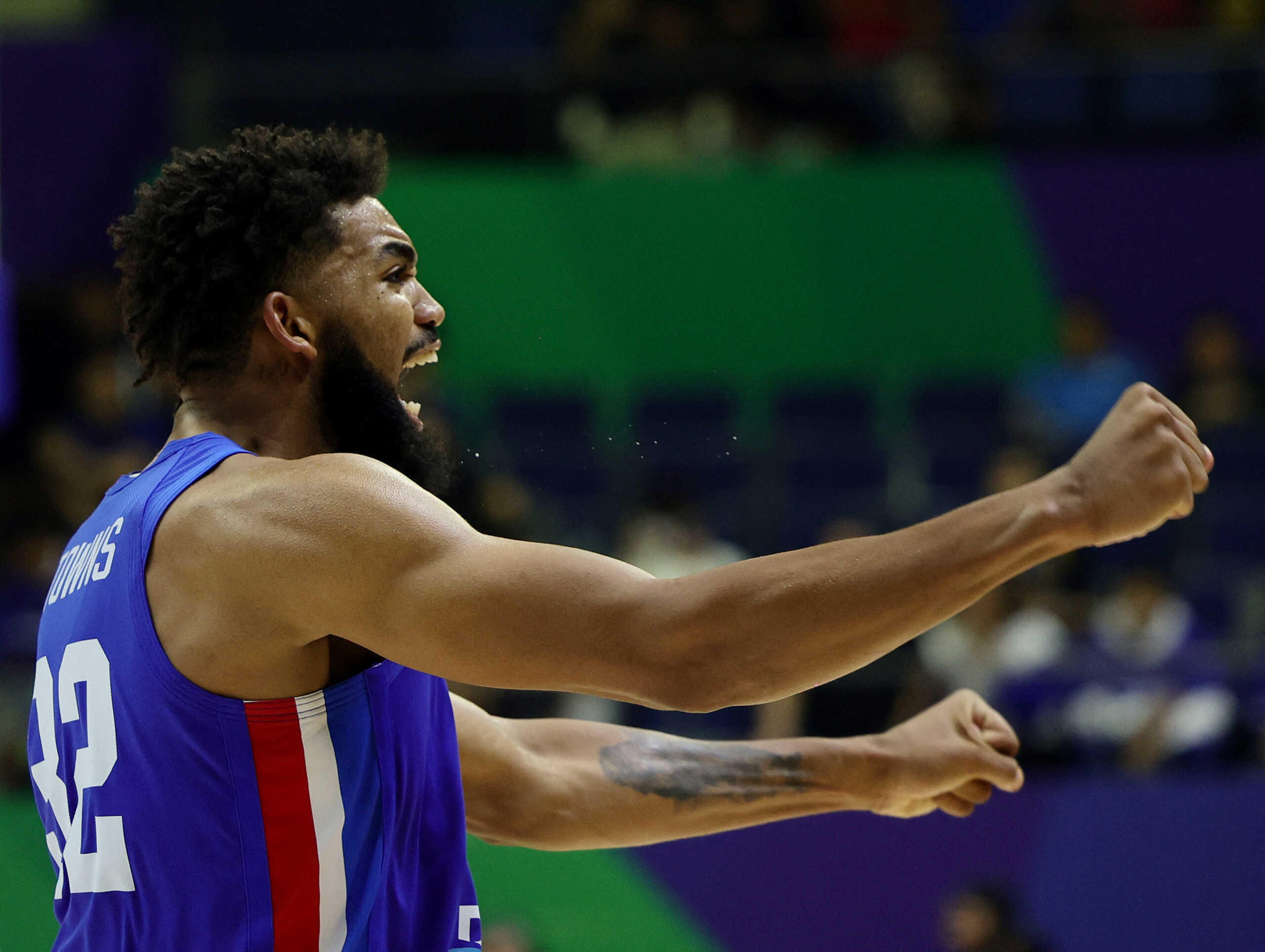 Basketball - FIBA World Cup 2023 - First Round - Group A - Italy v Dominican Republic - Araneta Coliseum, Quezon, Philippines - August 27, 2023  Dominican Republic's Karl-Anthony Towns celebrates after winning the match REUTERS