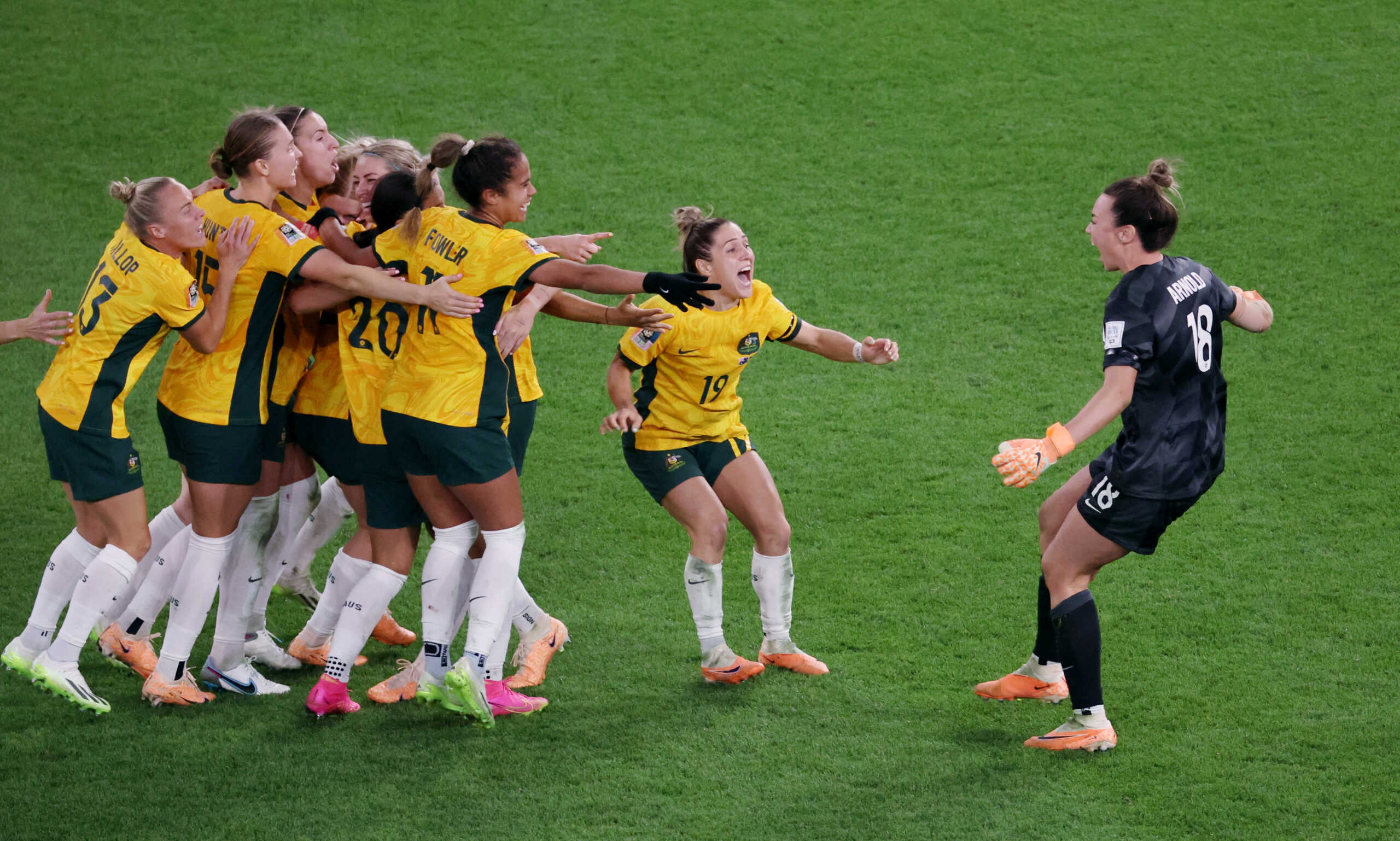 Soccer Football - FIFA Women’s World Cup Australia and New Zealand 2023 - Quarter Final - Australia v France - Brisbane Stadium , Brisbane, Australia - August 12, 2023 Australia's Mackenzie Arnold with teammates after winning the penalty shootout and progressing to the semi finals of the World Cup REUTERS
