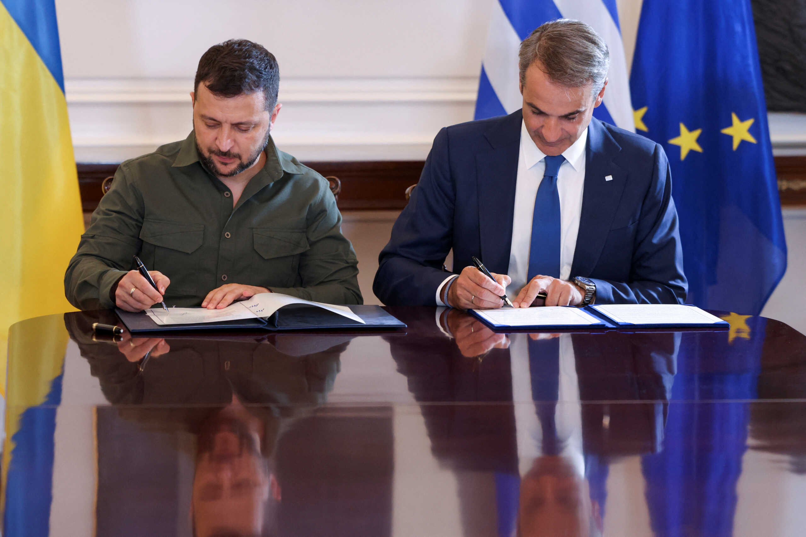 Greek Prime Minister Kyriakos Mitsotakis and Ukrainian President Volodymyr Zelenskiy meet at the Maximos Mansion in Athens, Greece, August 21, 2023. REUTERS