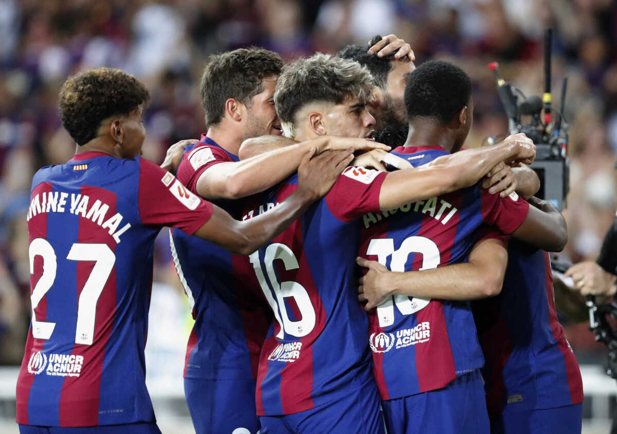 Soccer Football - LaLiga - FC Barcelona v Cadiz - Estadi Olimpic Lluis Companys, Barcelona, Spain - August 20, 2023 FC Barcelona's Pedri celebrates scoring their first goal with teammates REUTERS