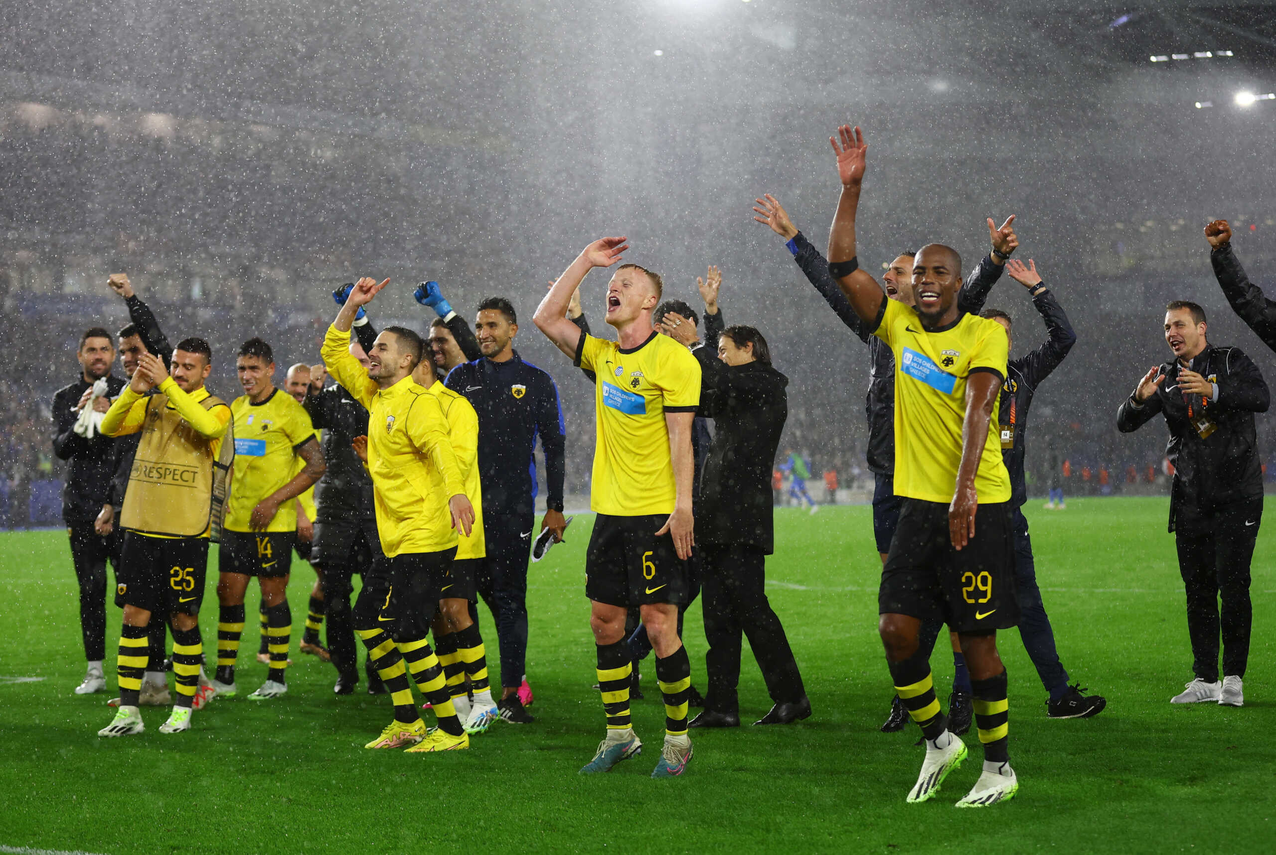 Soccer Football - Europa League - Group B - Brighton & Hove Albion v AEK Athens - The American Express Community Stadium, Brighton, Britain - September 21, 2023 AEK Athens' Jens Jonsson, Djibril Sidibe and teammates celebrate after the match Action Images via Reuters