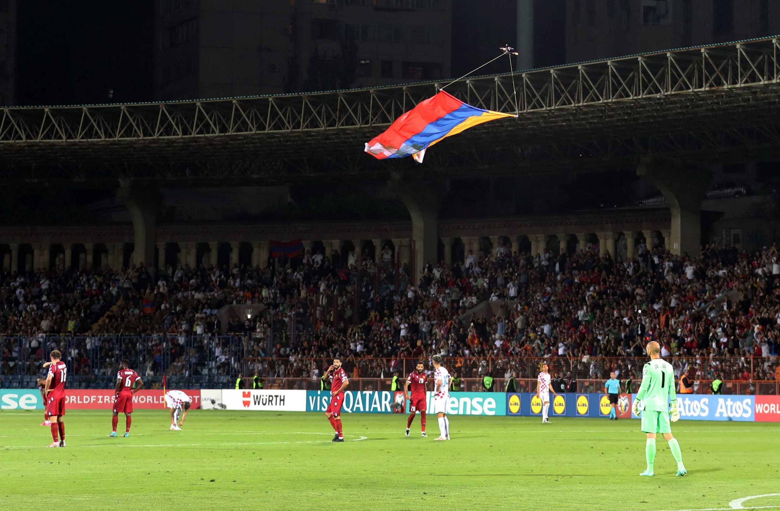 Soccer Football - Euro 2024 Qualifier - Group D - Armenia v Croatia - Vazgen Sargsyan Republican Stadium, Yerevan, Armenia - September 11, 2023 A drone is pictured flying in the stadium carrying a flag of the Republic of Artsakh during the match Photolure via REUTERS
