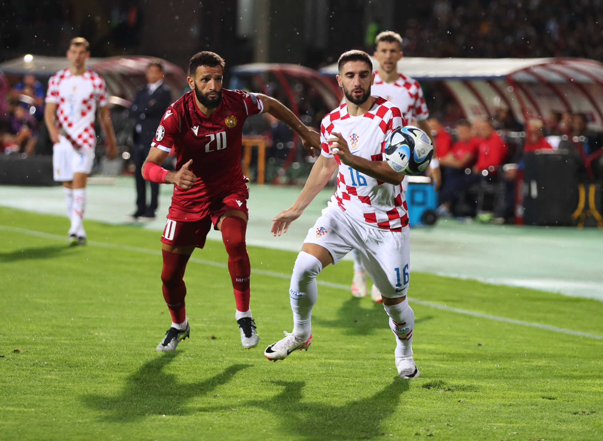 Soccer Football - Euro 2024 Qualifier - Group D - Armenia v Croatia - Vazgen Sargsyan Republican Stadium, Yerevan, Armenia - September 11, 2023 Croatia's Luka Ivanusec in action with Armenia's Artak Dashyan Photolure via REUTERS