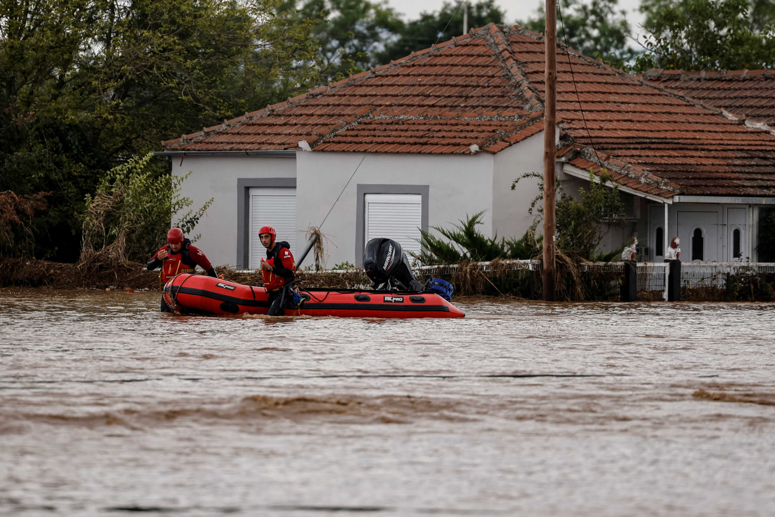 Rescuers work to transfer residents from flooded areas after storm Daniel caused flooding in Astritsa, Greece September 7, 2023. REUTERS