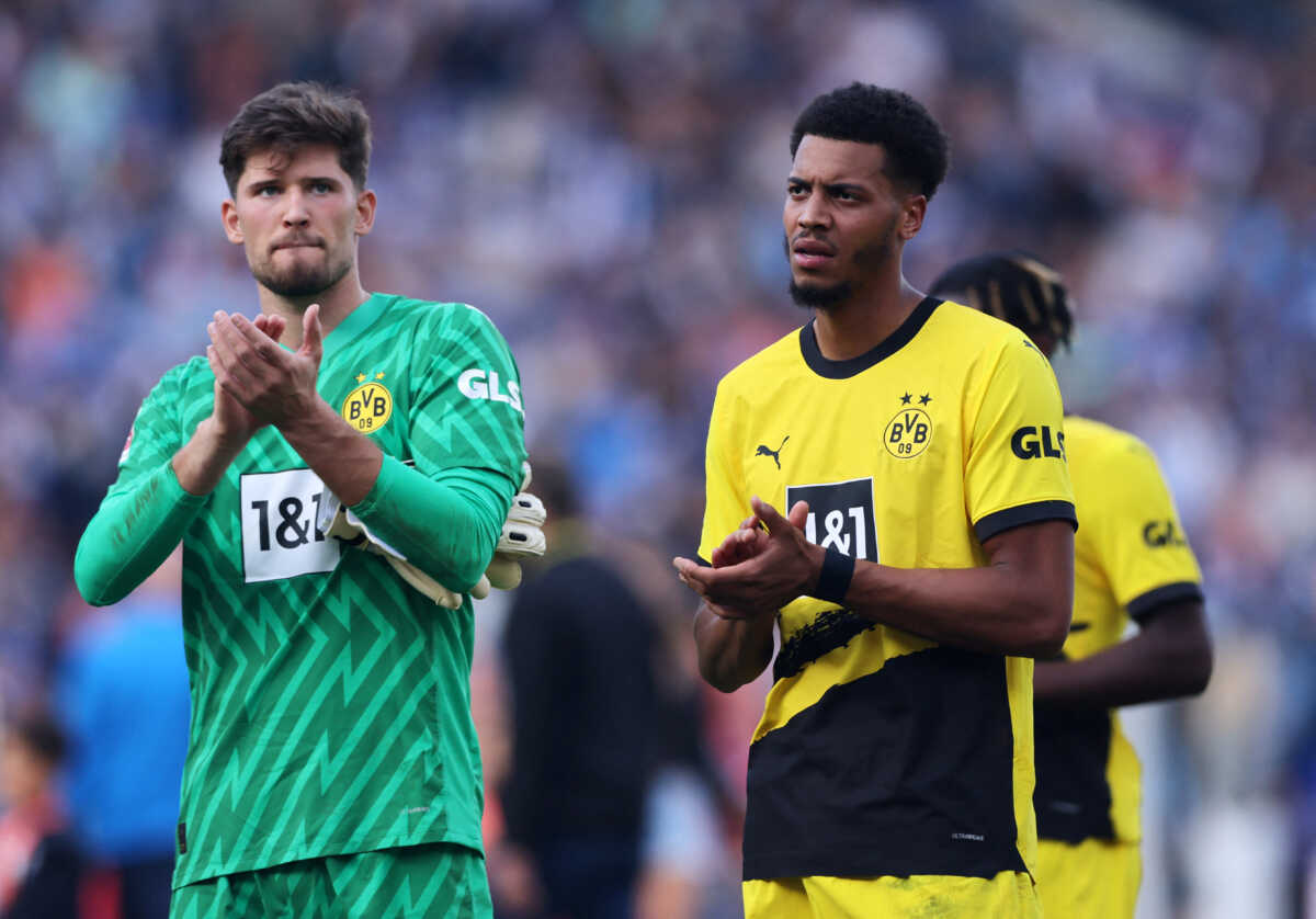 Soccer Football - Germany - Bundesliga - VfL Bochum v Borussia Dortmund - Ruhrstadion, Bochum, Germany - August 26, 2023 Borussia Dortmund's Gregor Kobel and Felix Nmecha applaud fans after the match REUTERS