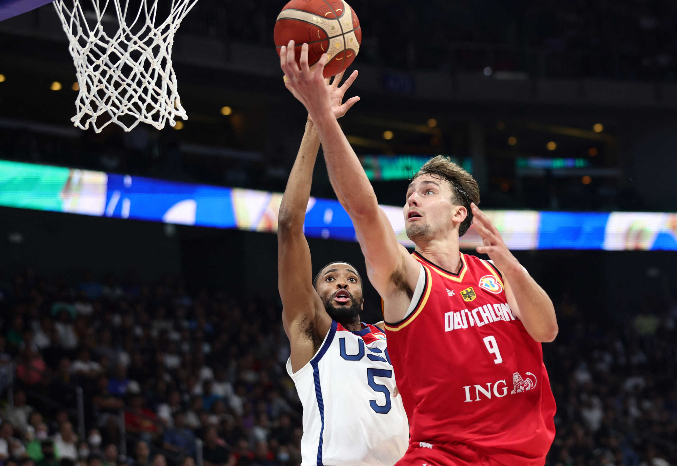 Basketball - FIBA World Cup 2023 - Semi Final - United States v Germany - Mall of Asia Arena, Manila, Philippines - September 8, 2023 Germany's Franz Wagner in action with Mikal Bridges of the U.S. REUTERS