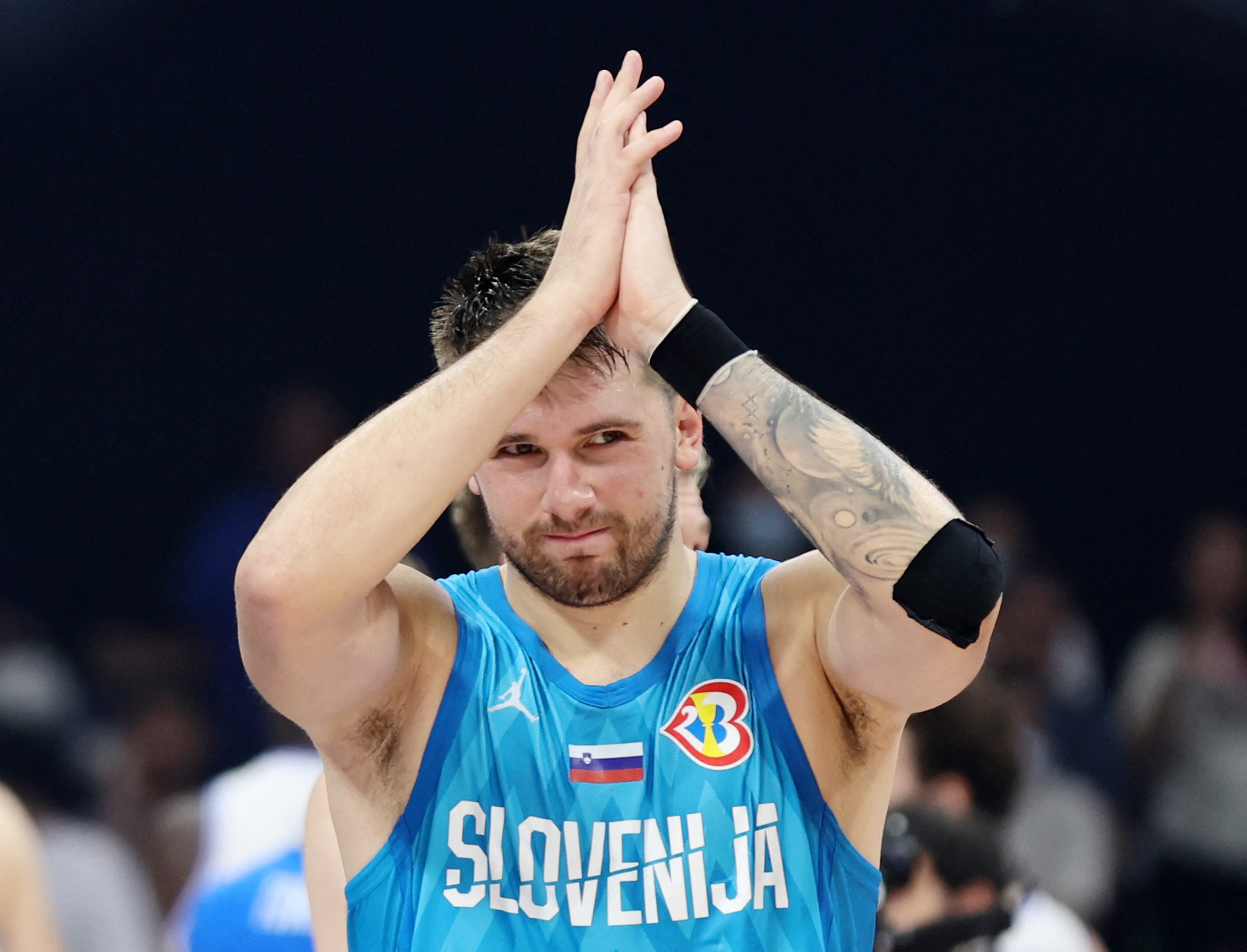 Basketball - FIBA World Cup 2023 - Classification Games 7-8 - Italy v Slovenia - Mall of Asia Arena, Manila, Philippines - September 9, 2023 Slovenia's Luka Doncic applauds fans after the match REUTERS