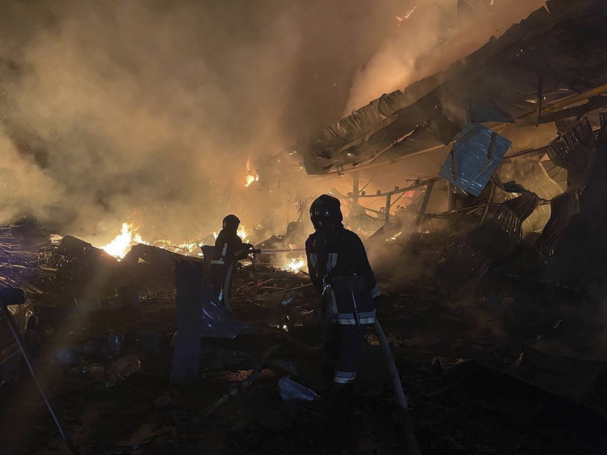 epa10799378 A handout picture made available by the State Emergency Service shows rescuers working at the place of rocket debris falling on a hypermarket in the southern Ukrainian city of Odesa, Ukraine, 14 August 2023 amid the Russian invasion. Odesa was attacked overnight with eight rockets and 15 shock drones, all of them shot down according to a statement from the Ukraine Air Force. At least three people were injured as State Emergency Service reported. Russian troops entered Ukrainian territory in February 2022, starting a conflict that has provoked destruction and a humanitarian crisis.  EPA