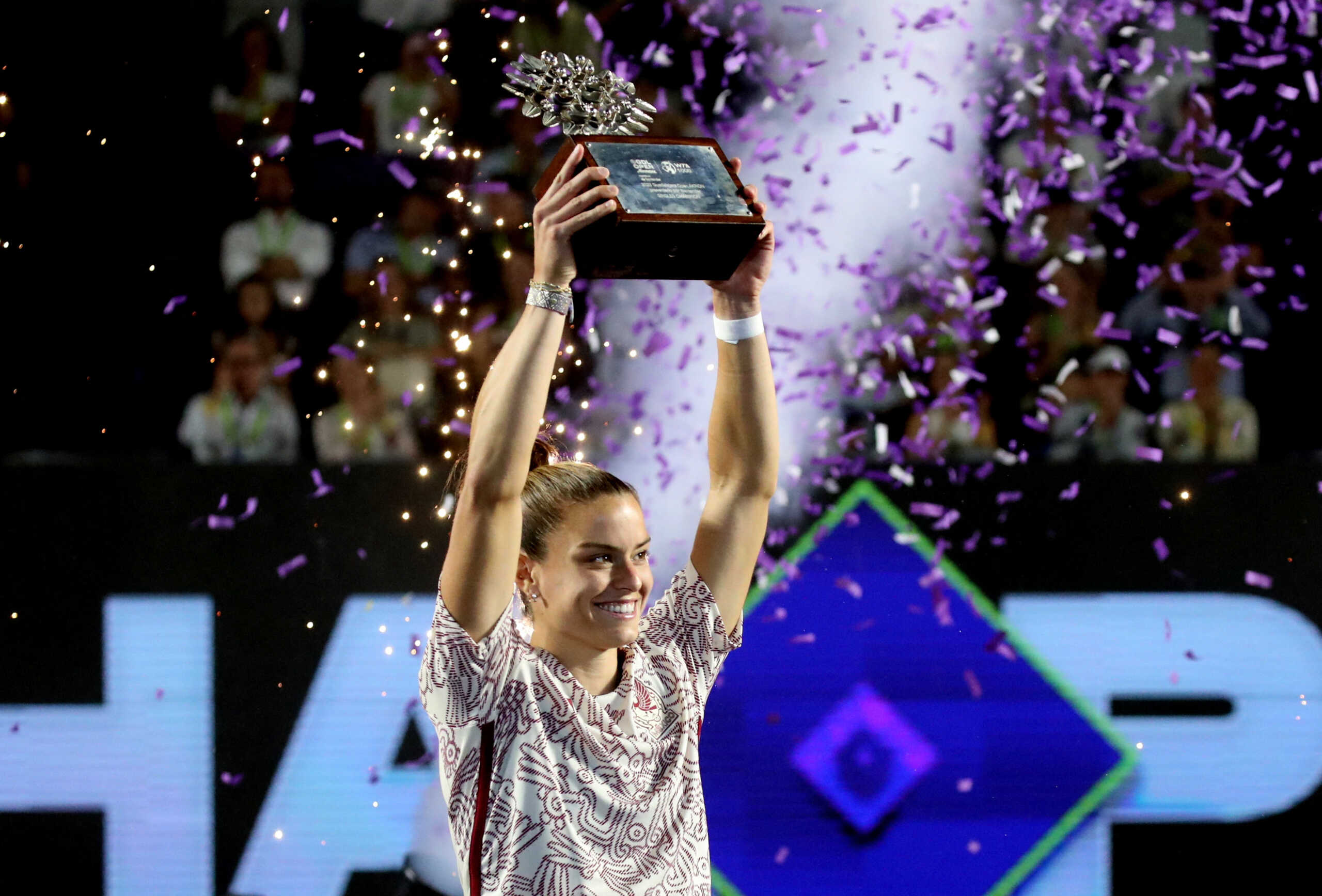 Tennis - WTA 1000 - Guadalajara Open - Panamerican Tennis Center, Guadalajara, Mexico - September 23, 2023 Greece's Maria Sakkari celebrates with the trophy after winning her final match against Caroline Dolehide of the U.S. REUTERS
