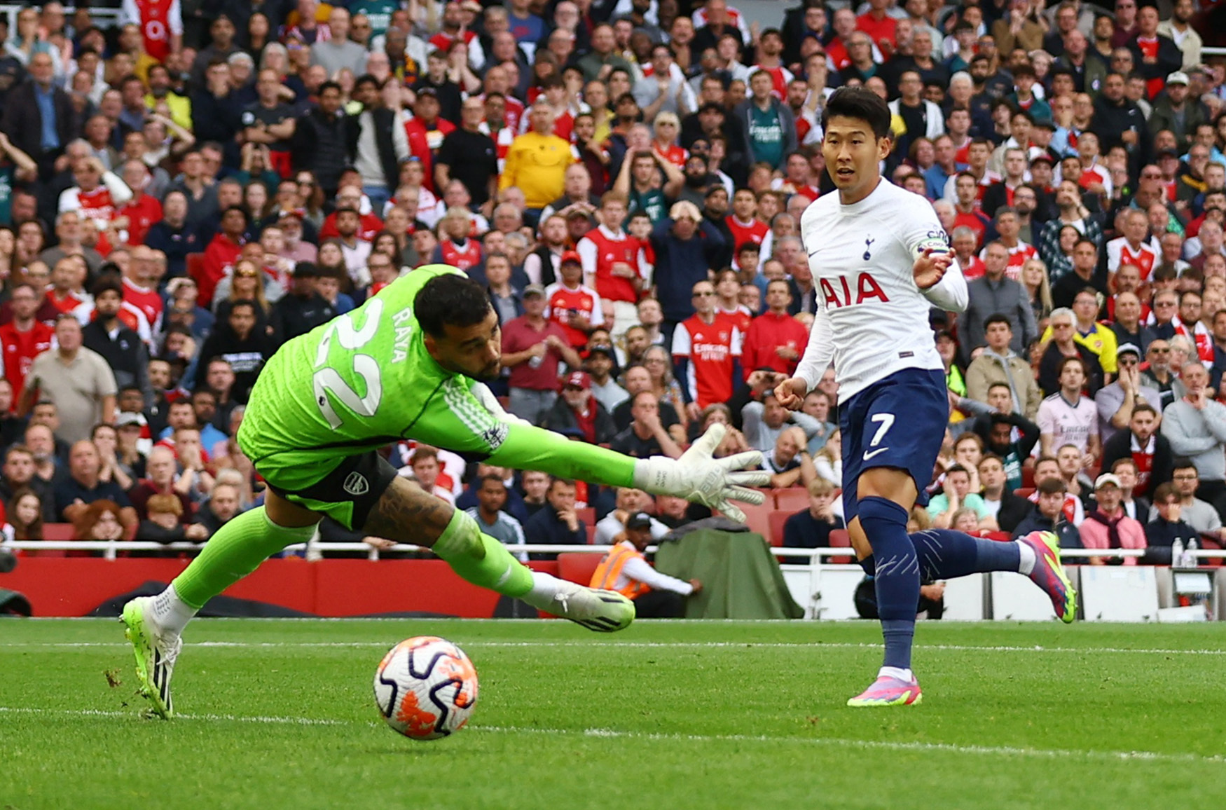 Soccer Football - Premier League - Arsenal v Tottenham Hotspur - Emirates Stadium, London, Britain - September 24, 2023 Tottenham Hotspur's Son Heung-min scores their second goal past Arsenal's David Raya Action Images via Reuters