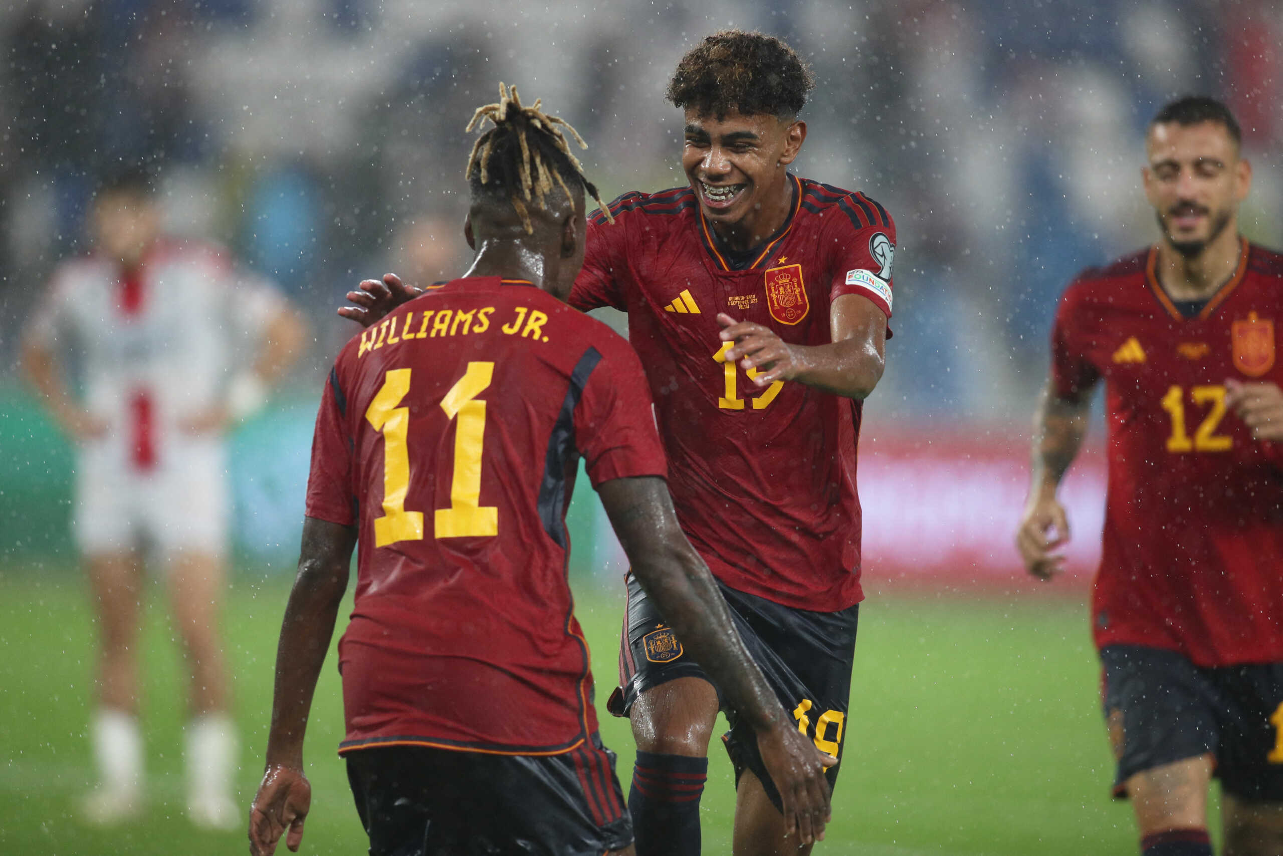 Soccer Football - Euro 2024 Qualifier - Group A - Georgia v Spain - Boris Paichadze Dinamo Arena, Tbilisi, Georgia - September 8, 2023 Spain's Lamine Yamal celebrates scoring their seventh goal with teammate Nico Williams REUTERS