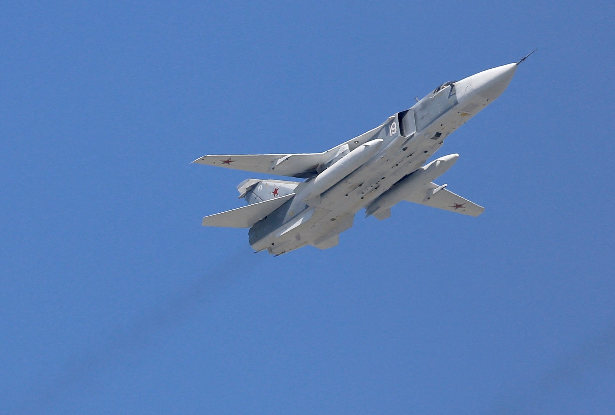 FILE PHOTO: Sukhoi Su-24 bombers fly in formation over the Red Square during the Victory Day parade in Moscow, Russia, May 9, 2015. REUTERS
