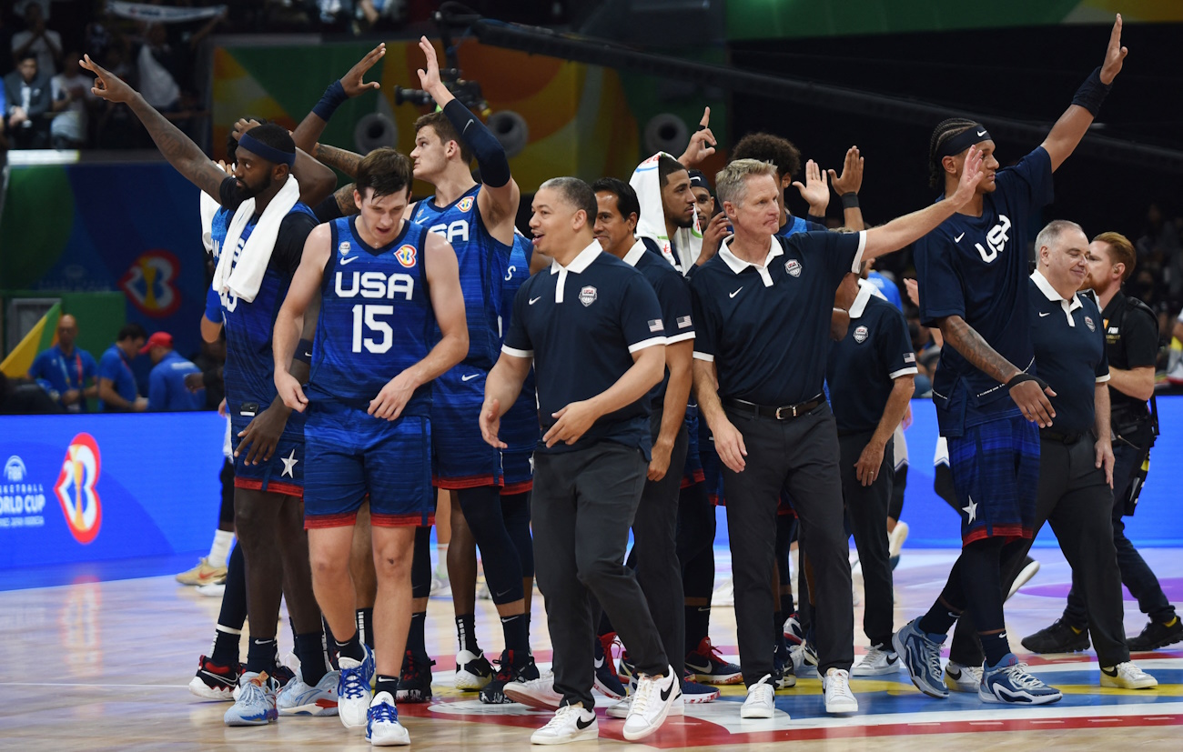 Basketball - FIBA World Cup 2023 - Quarter-Final - Italy v United States - Mall of Asia Arena, Manila, Philippines - September 5, 2023 United States players and coaching staff celebrate after winning the match REUTERS