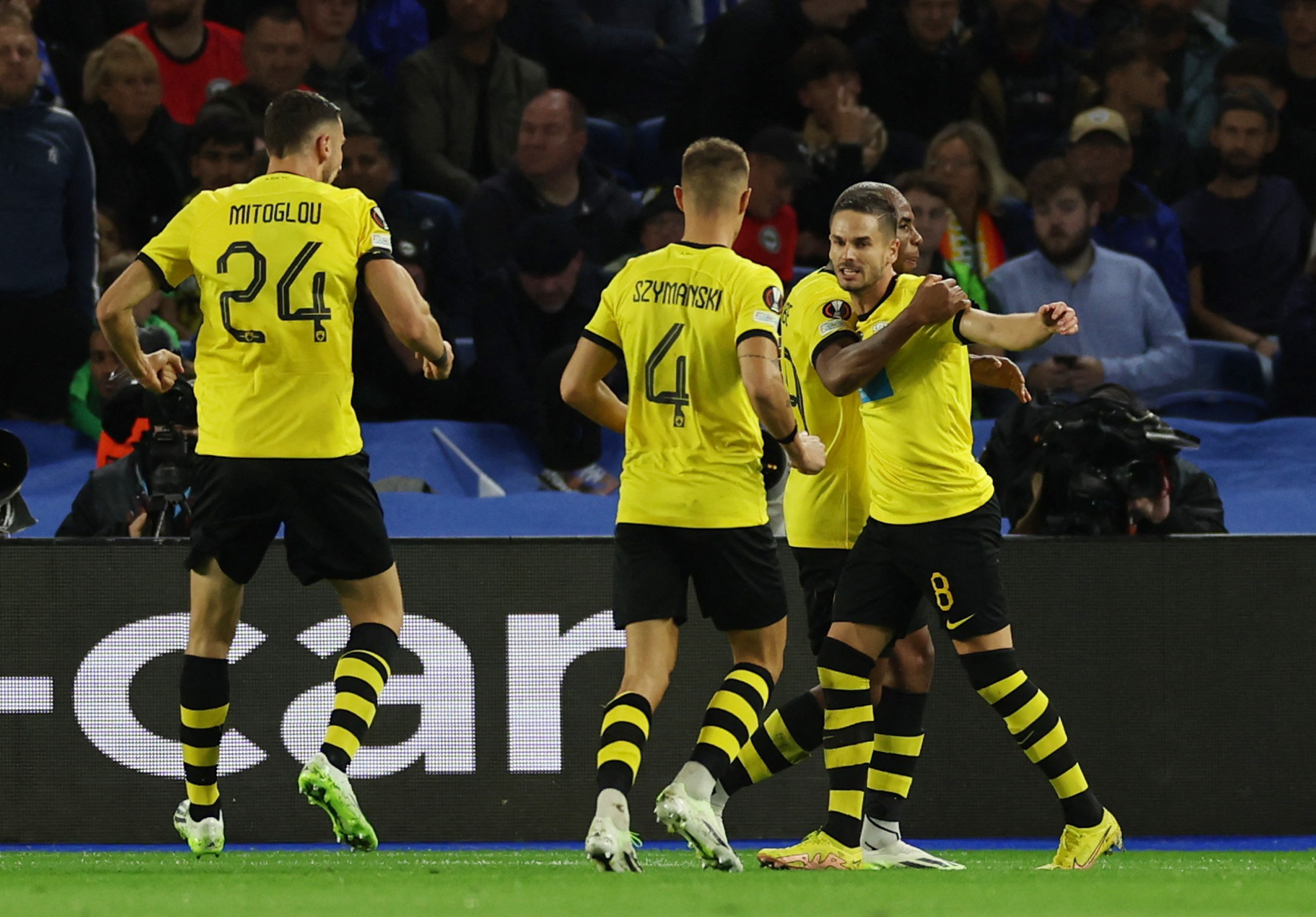 Soccer Football - Europa League - Group B - Brighton & Hove Albion v AEK Athens - The American Express Community Stadium, Brighton, Britain - September 21, 2023 AEK Athens' Mijat Gacinovic celebrates scoring their second goal with teammates REUTERS