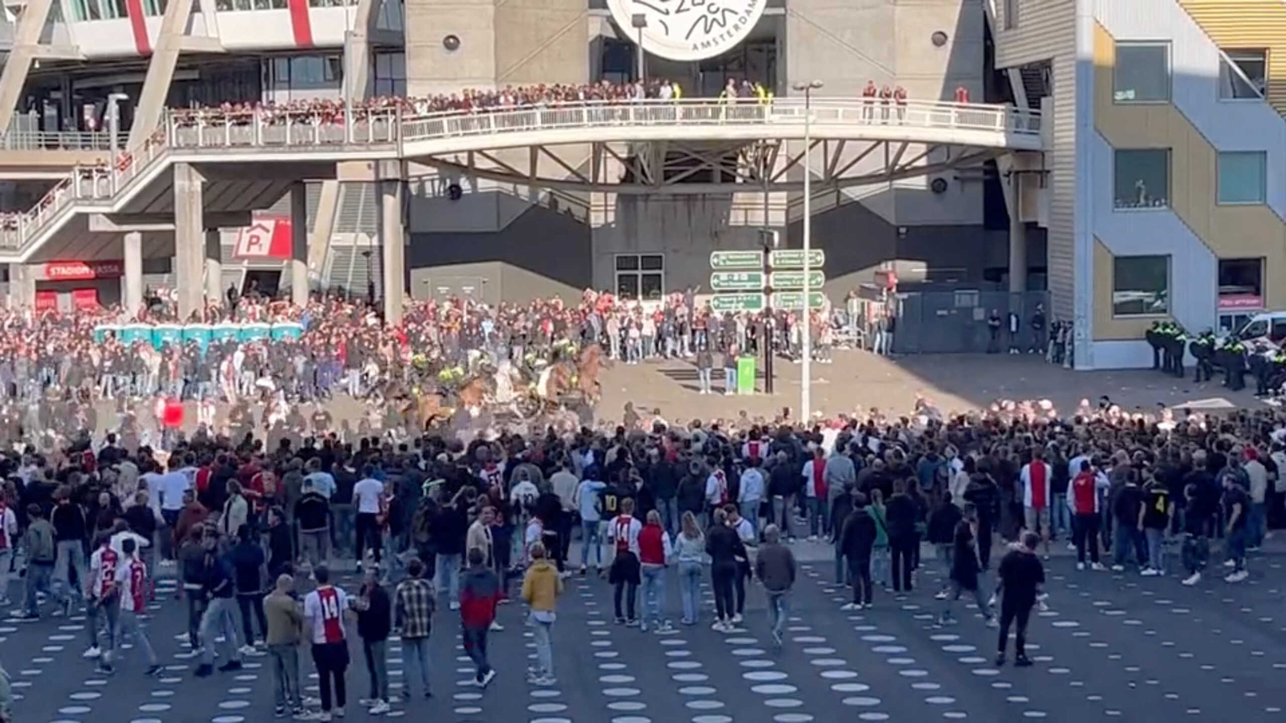 Mounted police officers disperse football fans rioting Johan Cruijff Arena, in Amsterdam, Netherlands, September 24, 2023, in this video screegrab obtained from social media. All About Ajax