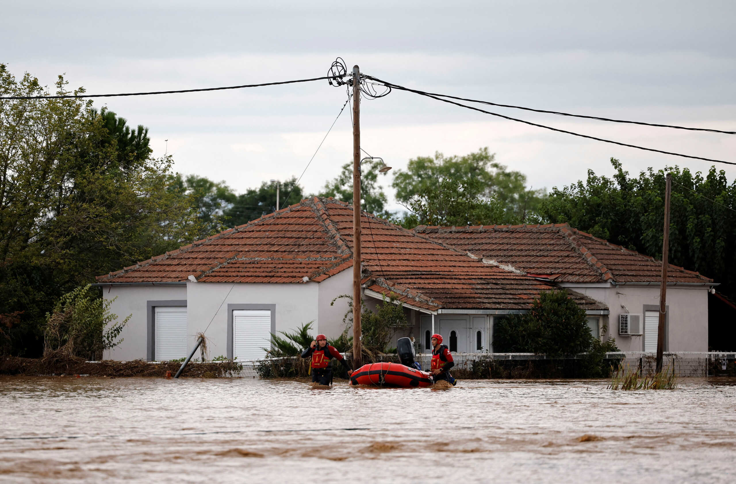 Rescue personnel operate during an evacuation from an area flooded due to the impact of storm Daniel, in Astritsa, Greece, September 7, 2023. REUTERS