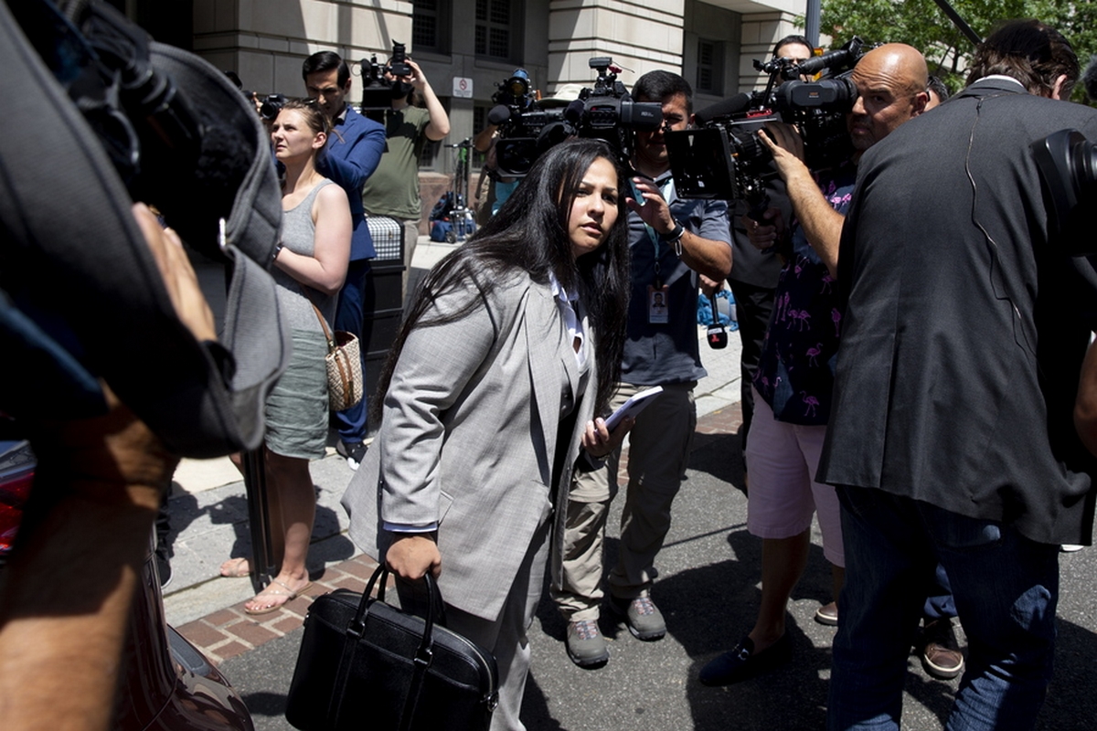 epa09260409 Mariel Colon (C), an attorney for Emma Coronel Aispuro - wife of Mexican drug lord Joaquin 'El Chapo' Guzman; is followed by members of the news media while crossing the street outside the E. Barrett Prettyman Federal Courthouse after Aispuro entered a guilty plea on federal charges related to drug trafficking in her husband's narcotics empire, in Washington, DC, USA, 10 June 2021. Sentencing is scheduled to take place in September 2021.  EPA