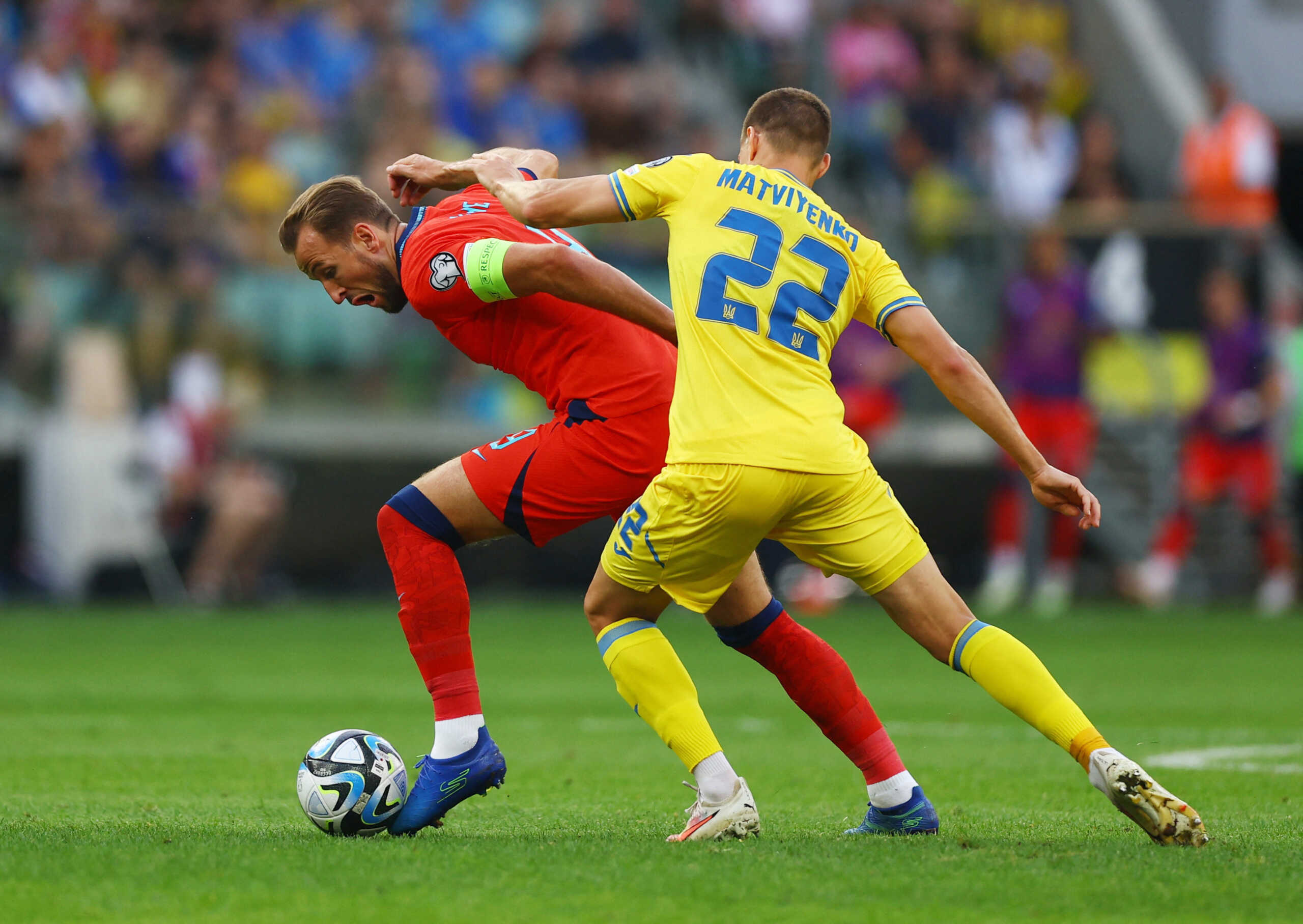 Soccer Football - Euro 2024 Qualifier - Group C - Ukraine v England - Tarczynski Arena, Wroclaw, Poland - September 9, 2023 England's Harry Kane in action with Ukraine's Mykola Matviyenko Action Images via Reuters