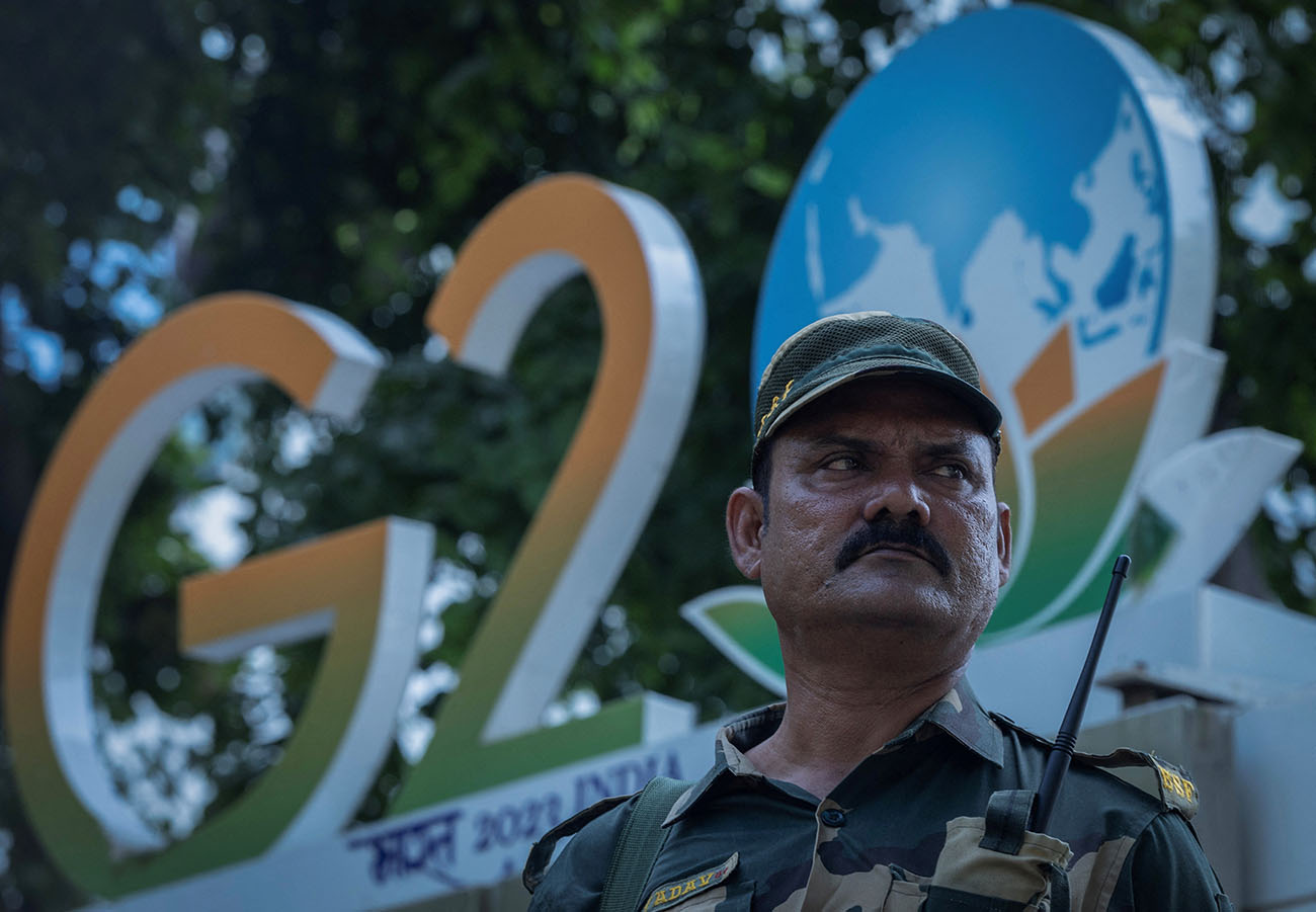 A paramilitary soldier stands guard outside a hotel during a rehearsal ahead of the G20 Summit in New Delhi, India, September 2, 2023. REUTERS