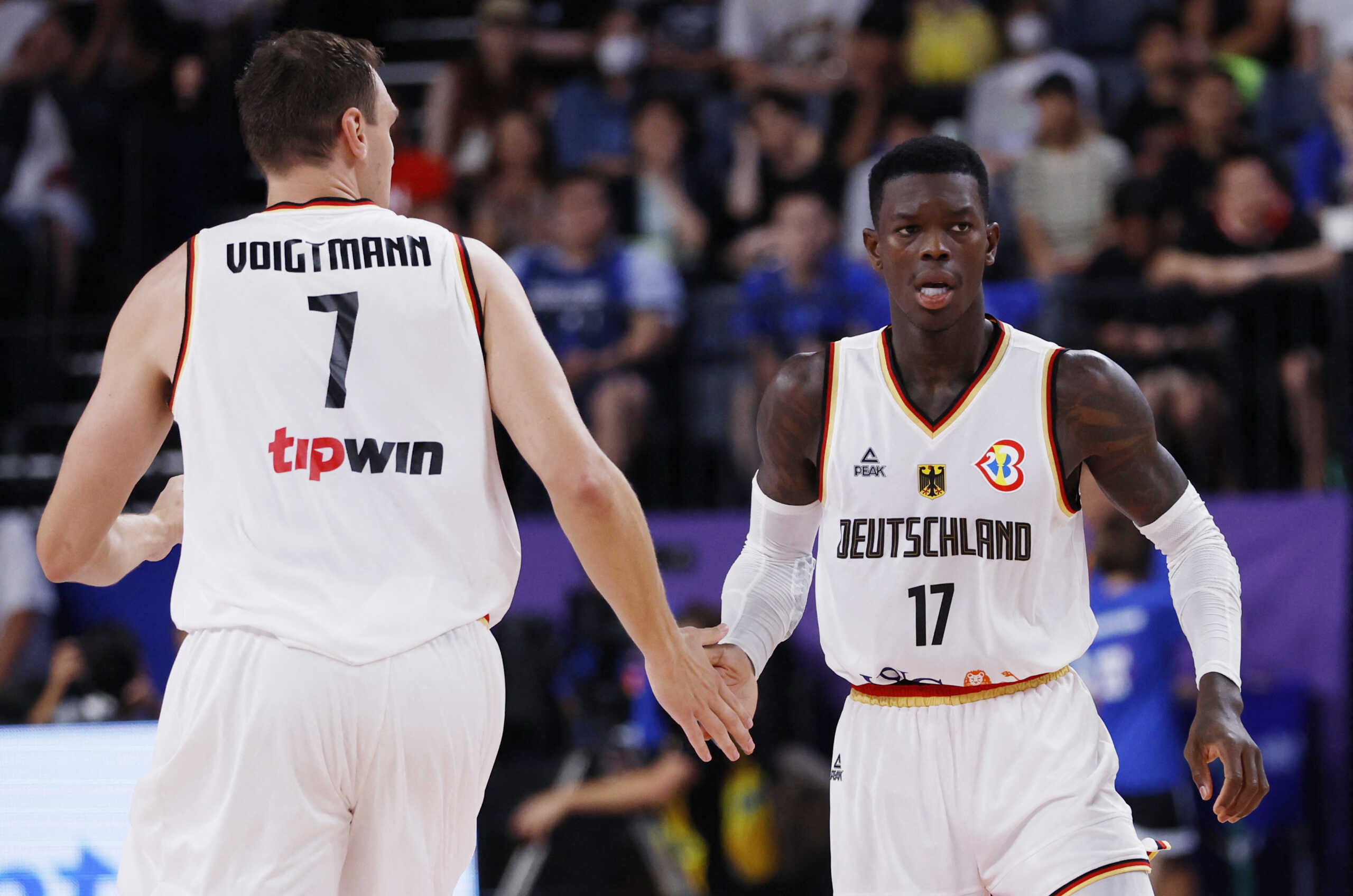 Basketball - FIBA World Cup 2023 - Second Round - Group K - Germany v Slovenia - Okinawa Arena, Okinawa, Japan - September 3, 2023 Germany's Dennis Schroder reacts REUTERS